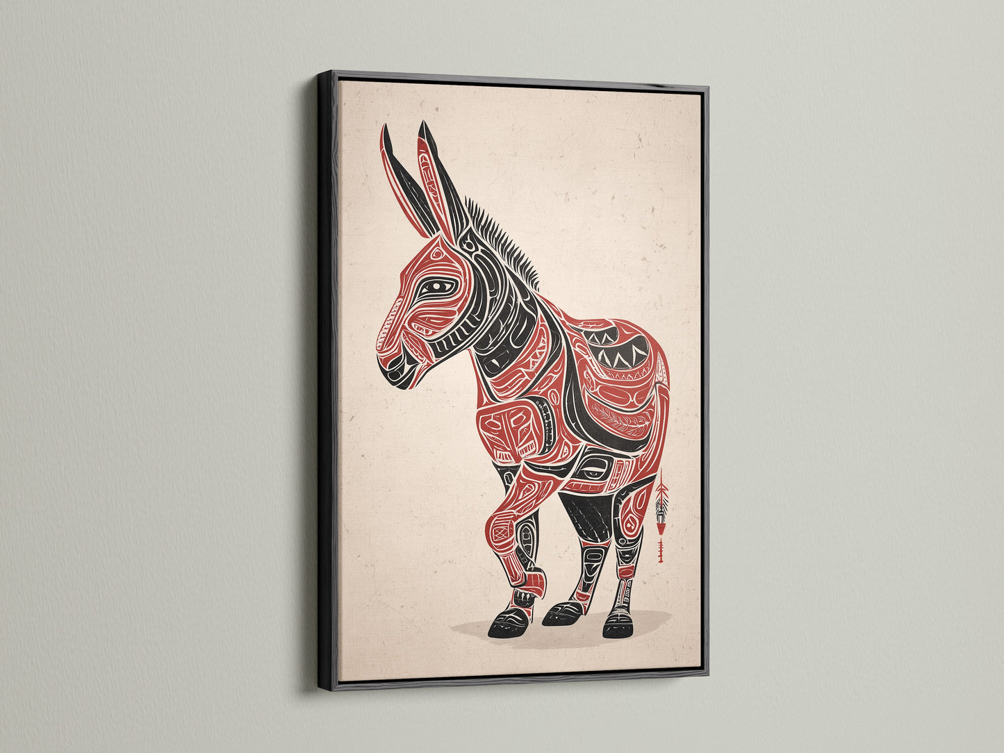 This image displays the Tribal Donkey art in a black frame. The black frame accentuates the red and black artwork. The donkey wall art stands out. It is a striking piece of native american art. The southwestern decor is suitable for various settings. This tribal canvas print adds sophistication.