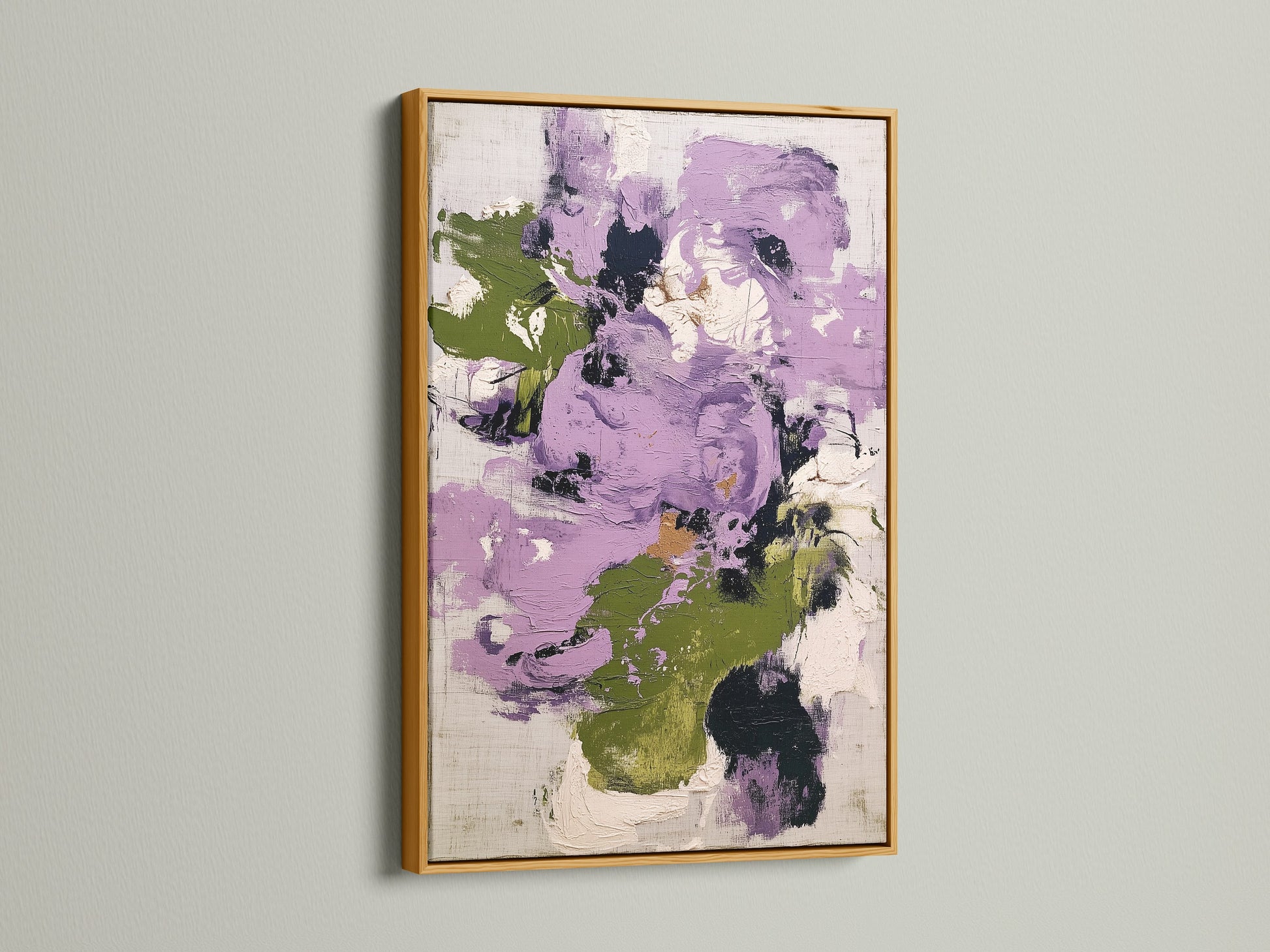 Abstract floral artwork featuring purple and green colors in a gold frame. This contemporary art piece brings a touch of luxury and elegance to any room. The botanical print is ideal for enhancing bedroom wall decor with its shimmering gold accents.