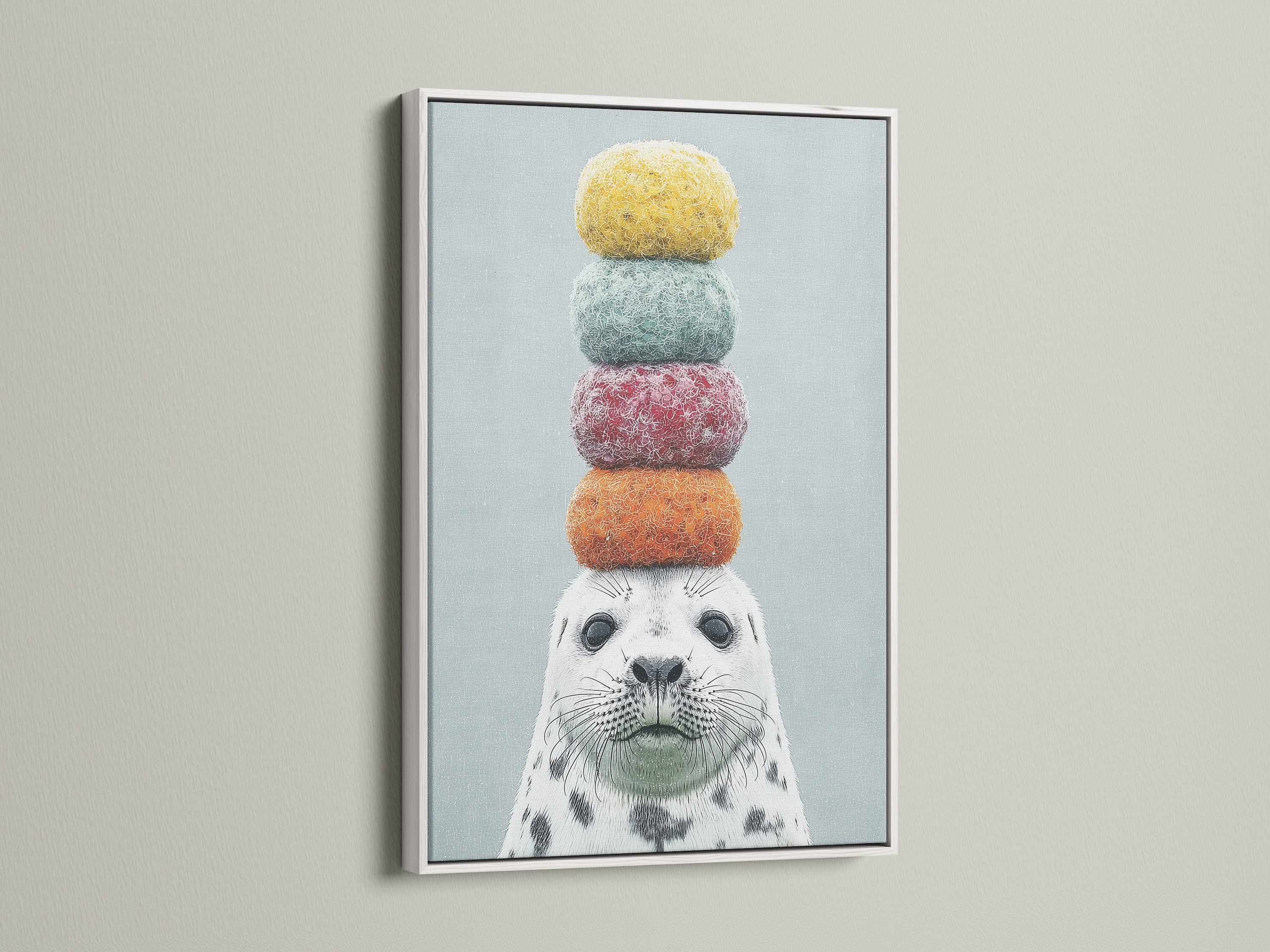 The framed canvas print showcases a cute seal artwork with macarons. The art is framed in a sleek white frame. This charming piece is perfect for adding a pop of color to a nursery or playroom. Discover the beauty of whimsical animal art.