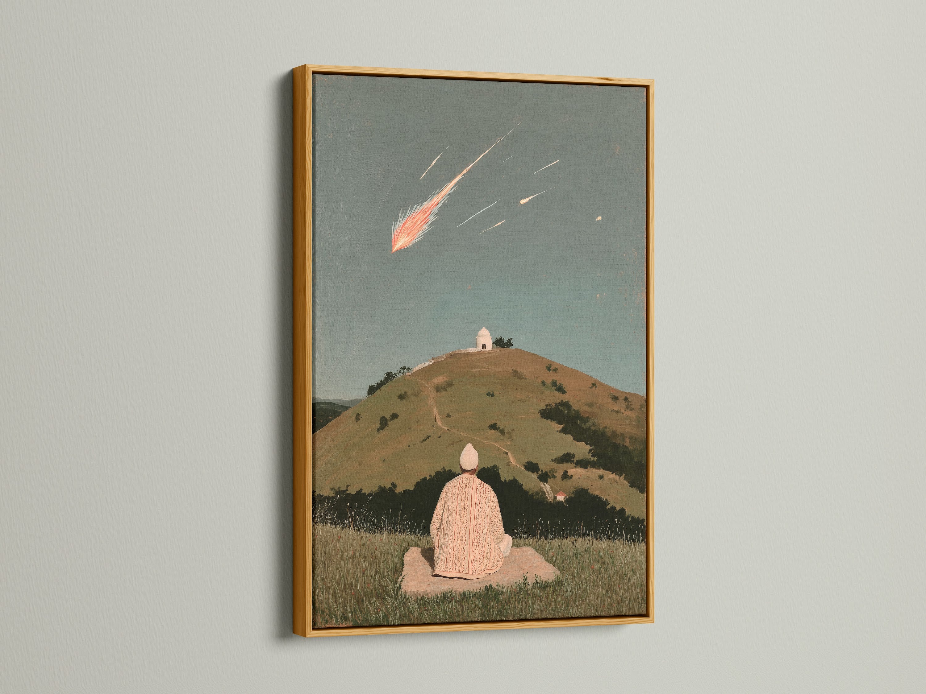 The Shooting Star canvas print is showcased in a gold frame. This celestial artwork adds a touch of elegance to any space. The artwork features a person meditating. The gold frame enhances the artwork's spiritual theme and overall aesthetic.
