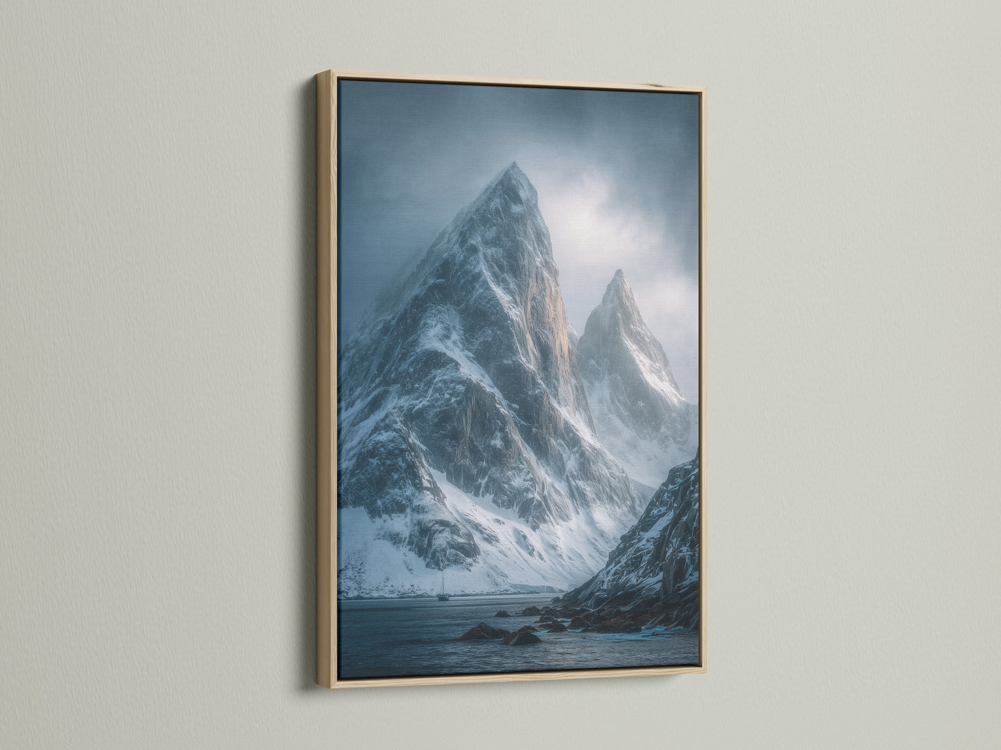 A close-up reveals an oak finish frame. This frame beautifully showcases a Snowy Mountain Peaks Canvas Print. It's ideal for Scandinavian home decor. The frame enhances coastal art prints and mountain artwork.