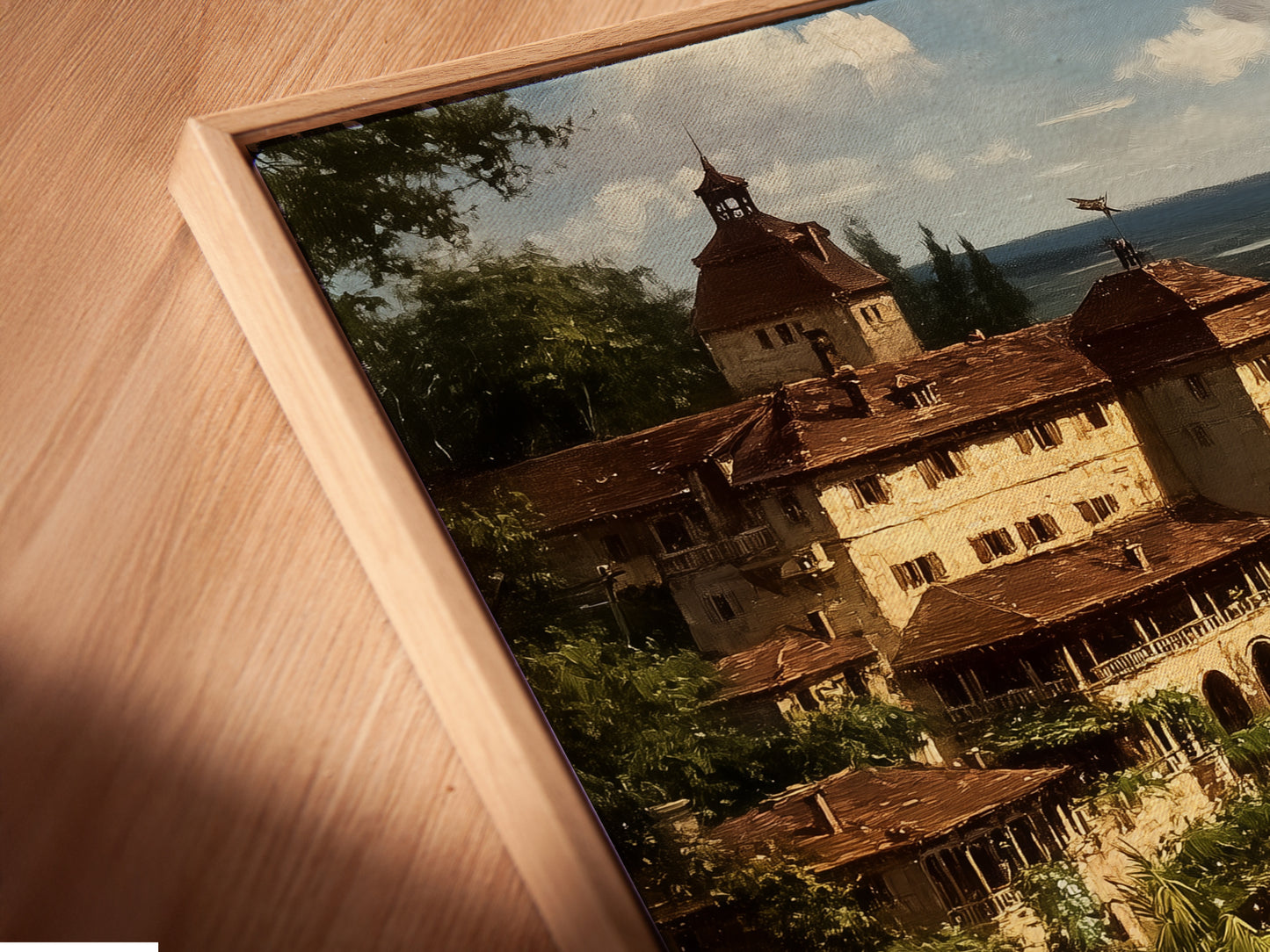 This is a close-up of a canvas print in a floating frame. The artwork showcases a beautiful coastal village scene. The floating frame gives the art a modern gallery look. It enhances the Mediterranean decor and sea view canvas.