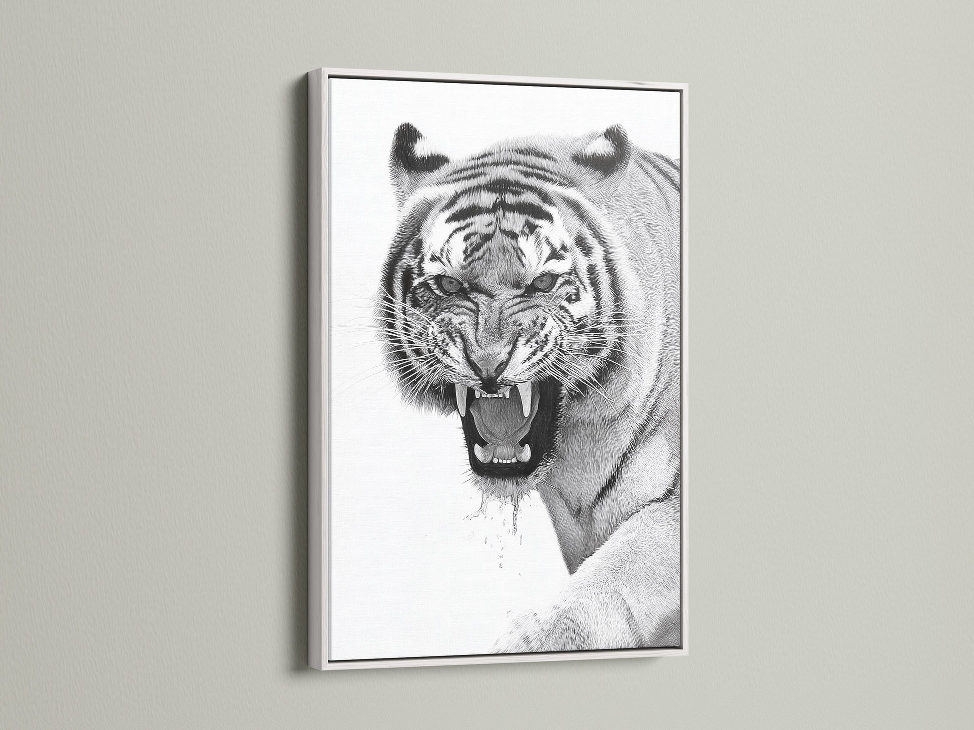 The artwork features a captivating tiger in a clean white frame. The white frame offers a modern aesthetic. The art will brighten any room. This piece adds a touch of elegance to your home. The contrast of the white frame makes the artwork pop.