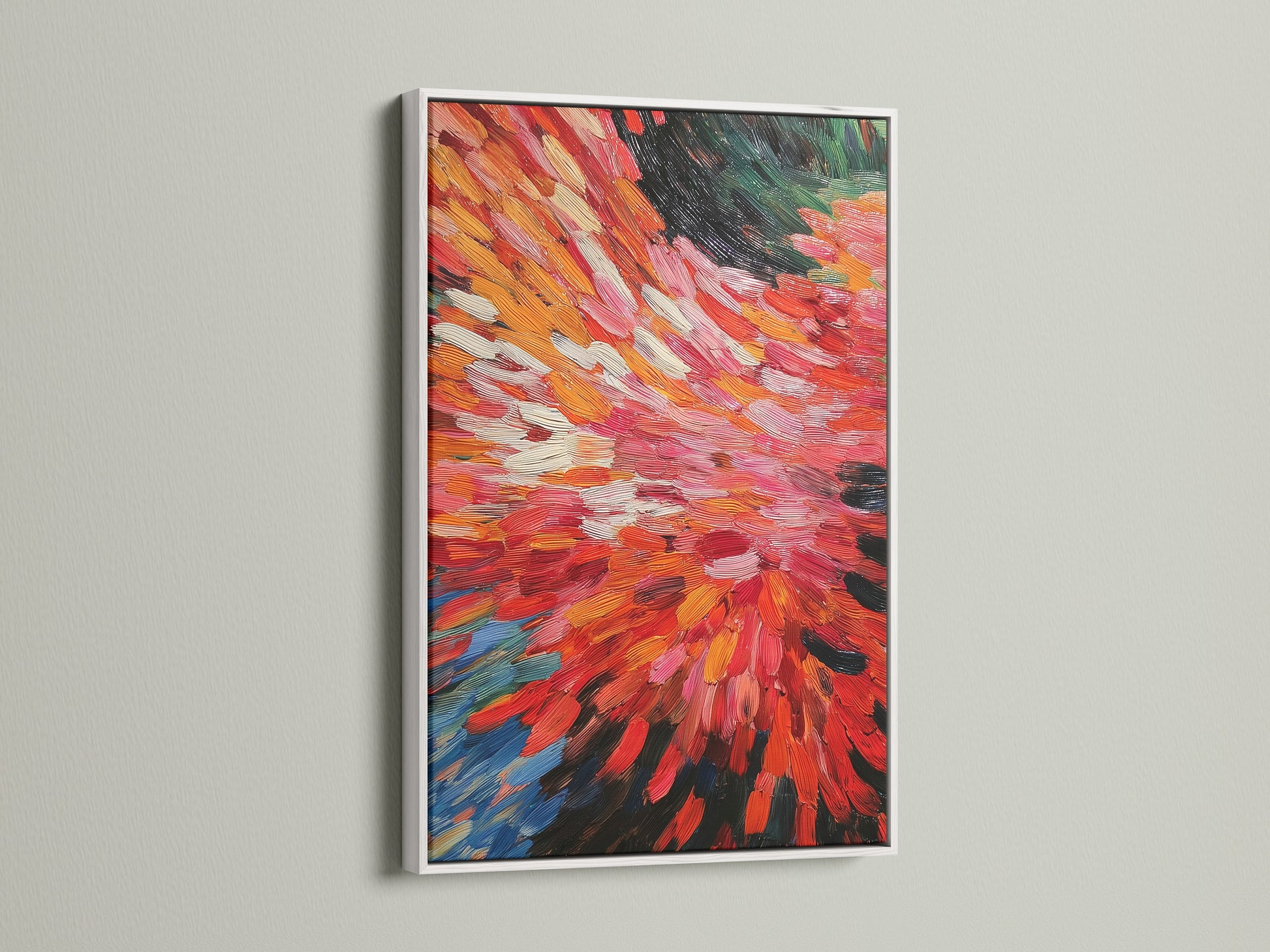 A white frame surrounds a captivating abstract burst artwork. The artwork features vibrant red and orange tones. Its dynamic brushstrokes make it a modern piece. Perfect for adding a pop of color to any room this contemporary print is sure to impress.