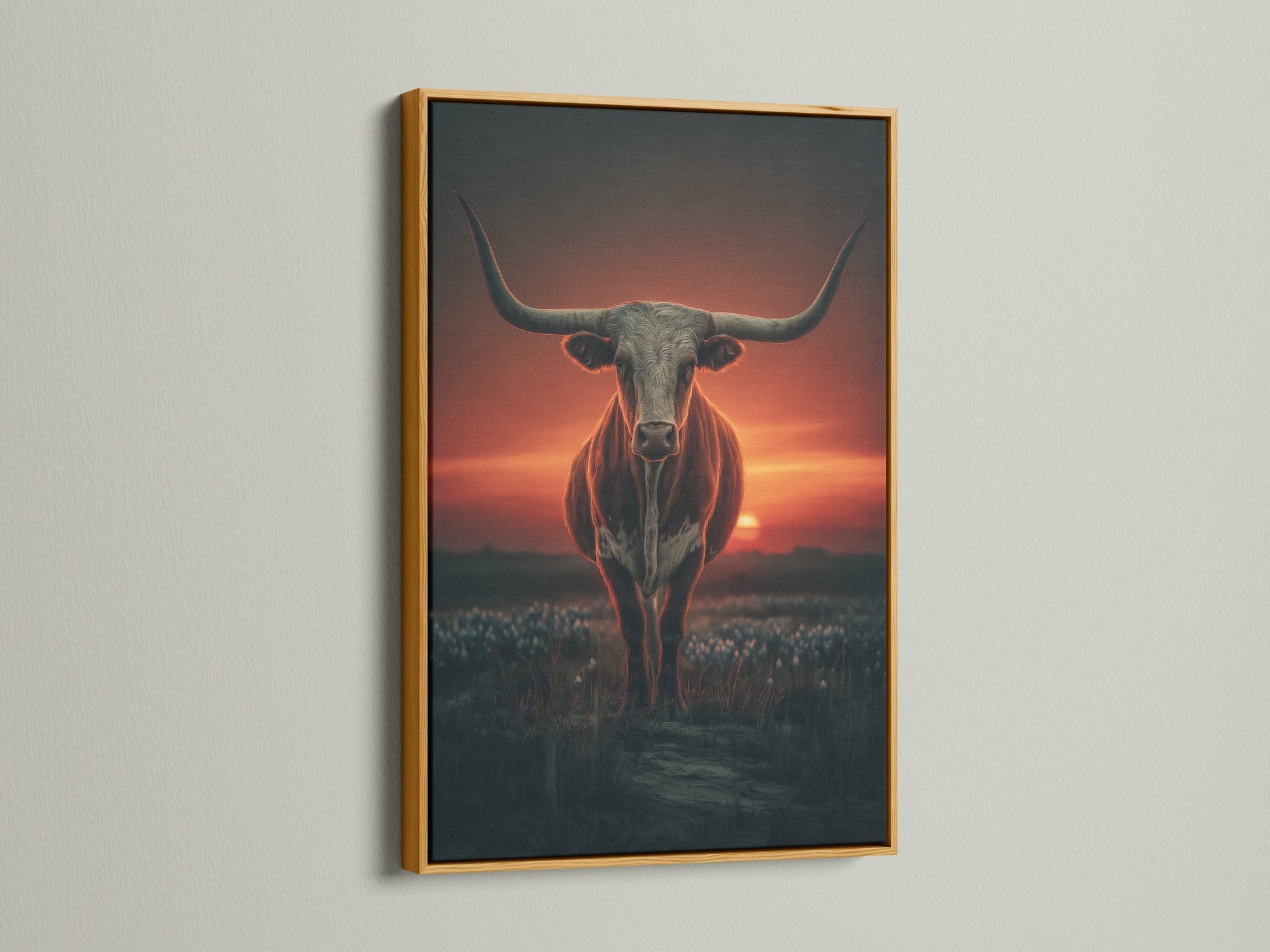 Longhorn bull artwork in a gold frame. This western wall art features a sunset backdrop. The gold frame adds a touch of elegance to the rustic artwork. Ideal for enhancing your country wall art collection. This bull canvas print adds a luxurious feel.