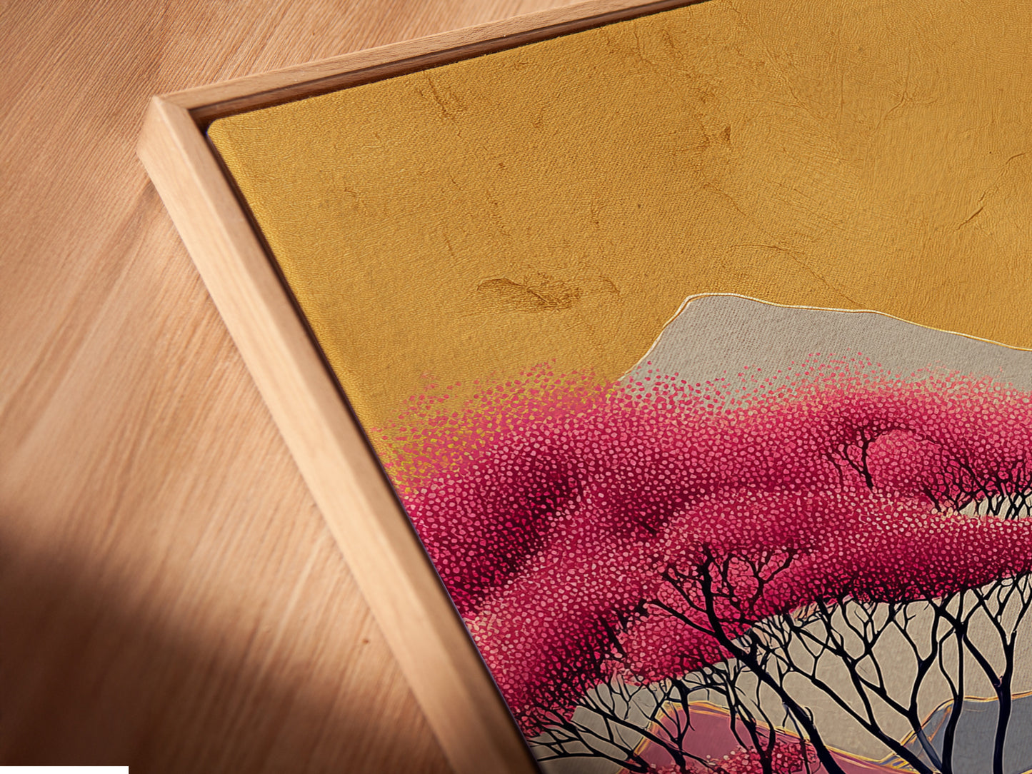 Close-up of a canvas print in a floating frame. This abstract mountain artwork is visually appealing. The pink purple landscape is perfect for modern decor. This contemporary print enhances any space. Great as living room or office artwork.