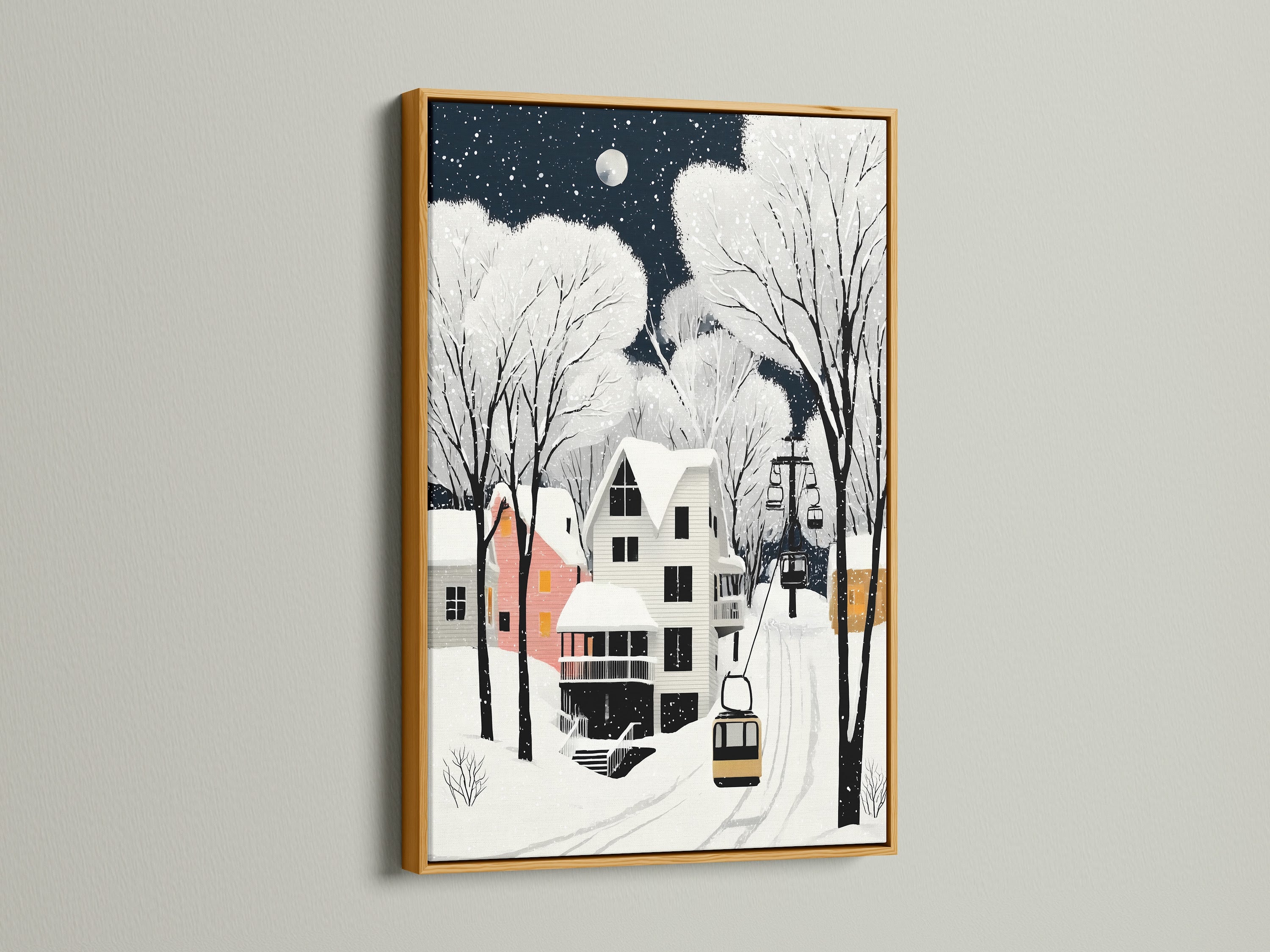 Winter Village art in a gold frame adds a touch of elegance. This cozy wall art is great for ski resorts lobbies and living rooms. It's the perfect snow scene print for a cozy cottage art vibe.