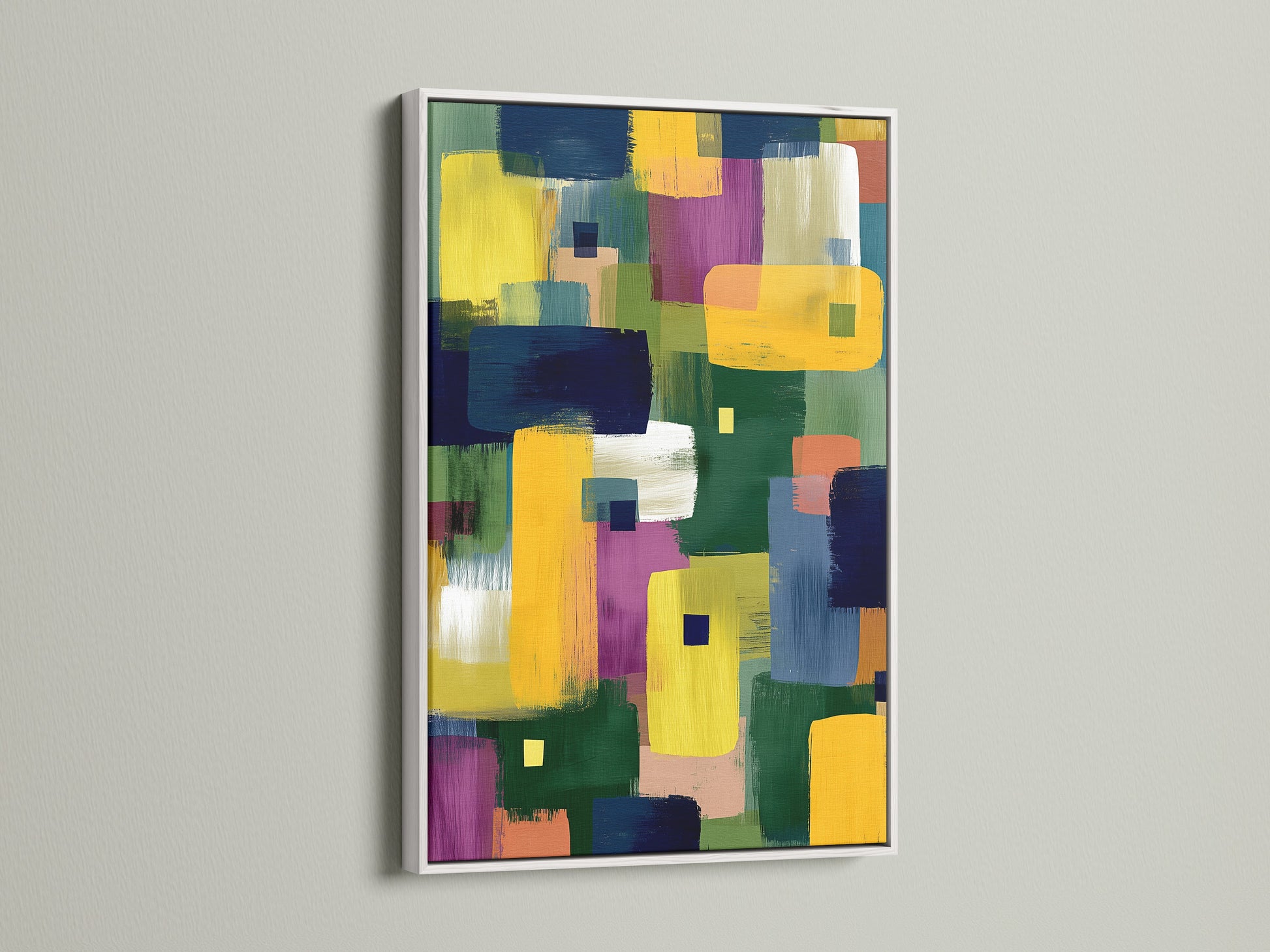 Abstract colorful artwork with a modern geometric pattern. The artwork features brushstroke painting in yellow blue and purple hues. This contemporary artwork is framed in a white frame. The white frame offers a clean modern look.