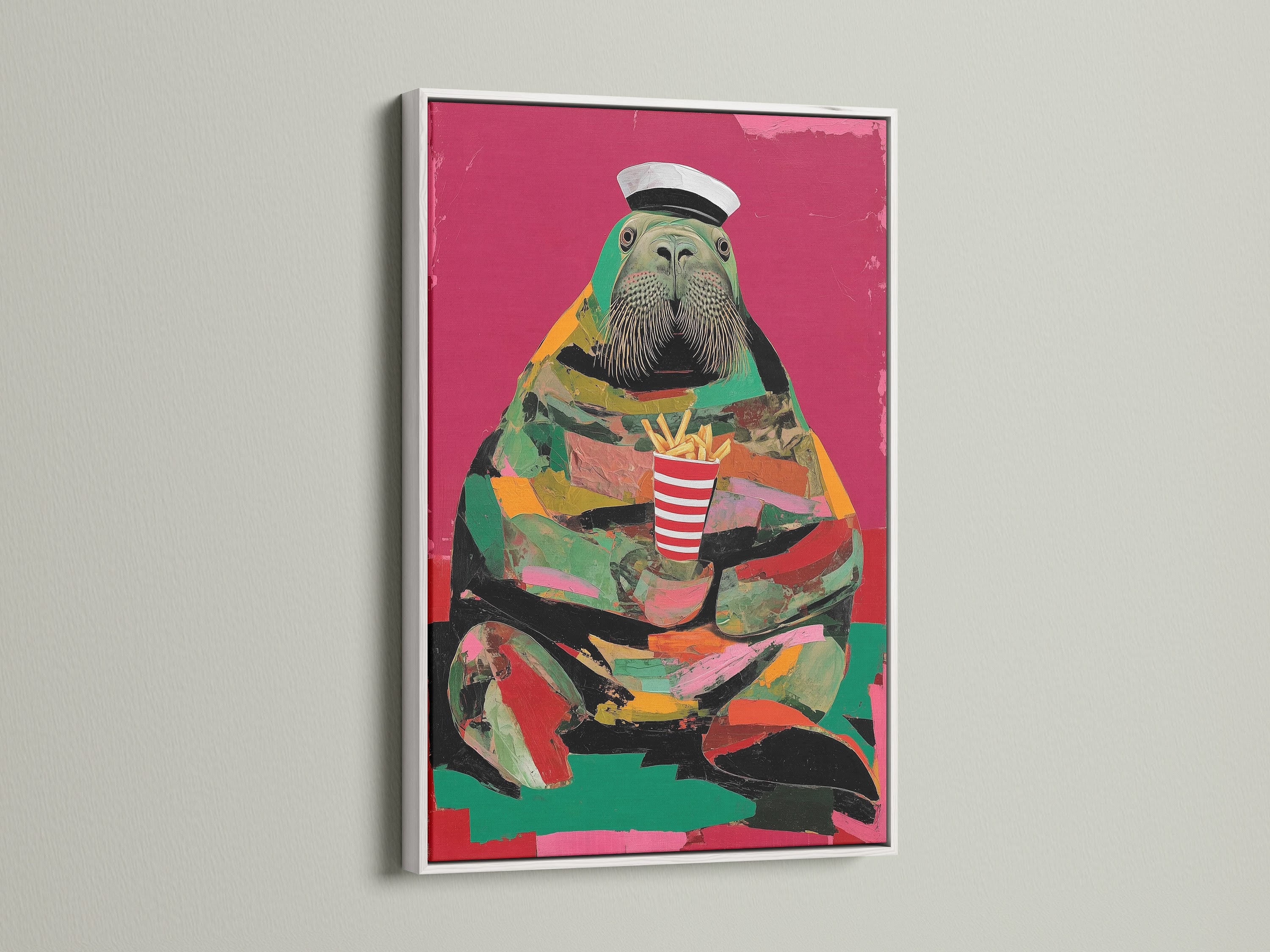 The walrus artwork in a white frame. This piece brings vibrant pop art to any room. Ideal for homeowners and cafe managers. It's a whimsical art choice that stands out. Pink and green colors.