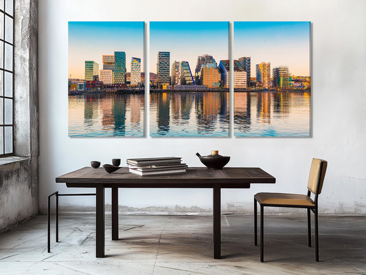 Refined skyline canvas print highlighting contemporary glass facades, sparkling sunset tones, and waterfront reflections for a sophisticated urban-themed artwork.