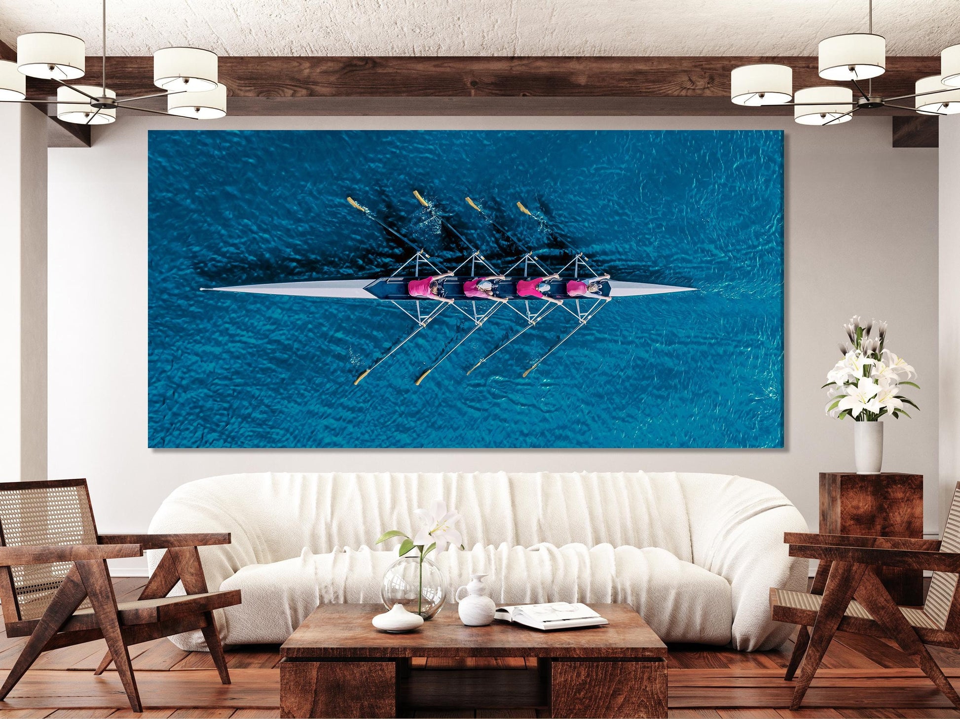 Dynamic rowing team wall art featuring a top-down view of four athletes cutting through vivid blue waters, crafted as a bold canvas print painting for sporting-inspired artwork.