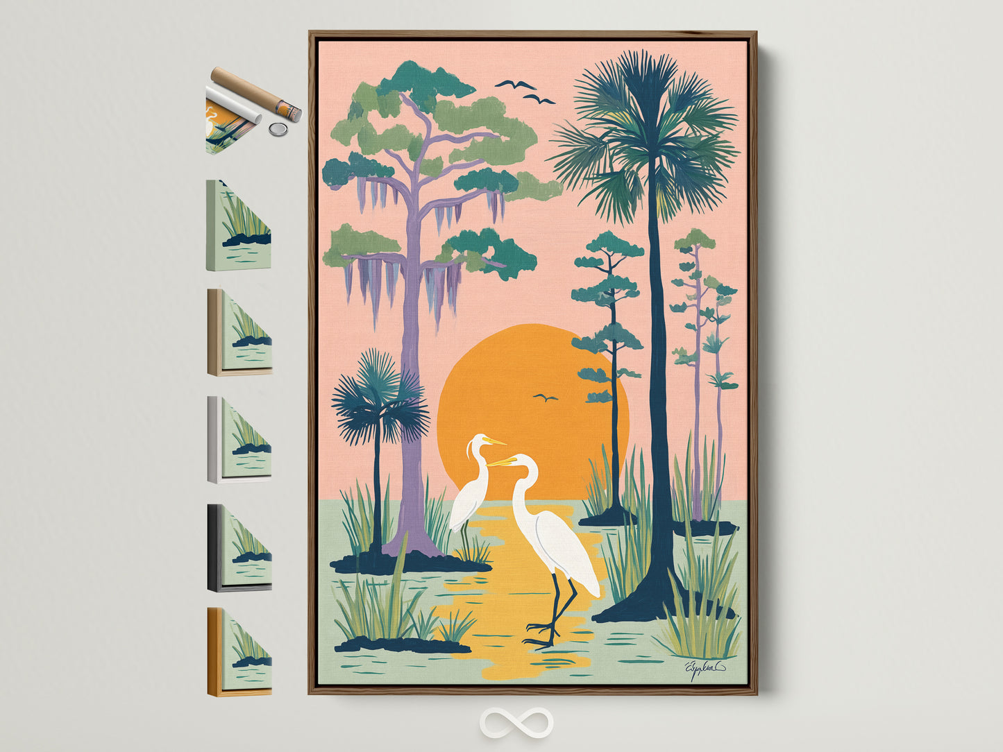Framed heron artwork on a wall. The artwork features two herons standing in a peach colored swamp. The sun sets behind them. The art is framed in a natural brown frame. Frame samples are displayed on the side. Perfect coastal wall art.