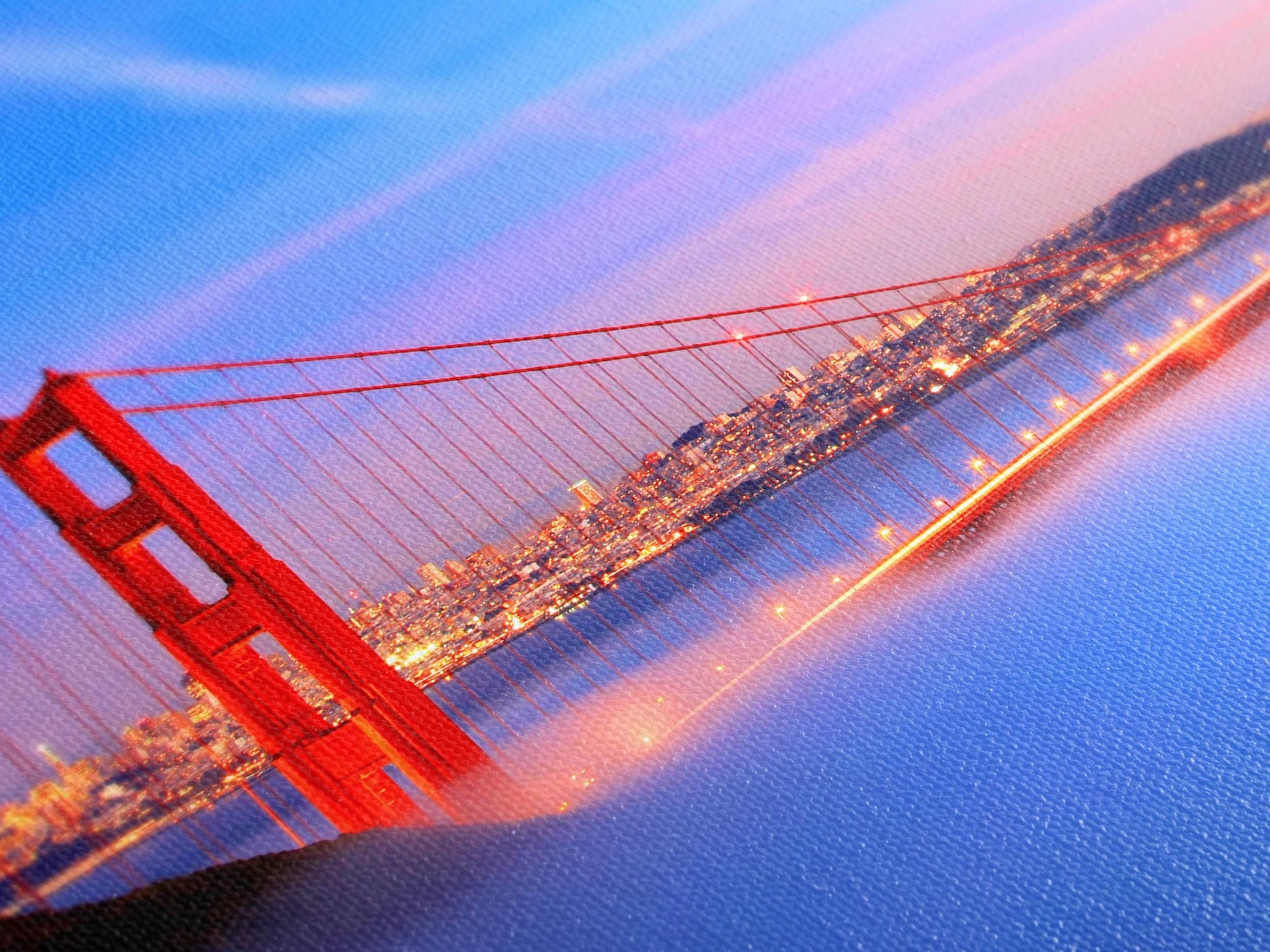 Dreamy coastal artwork featuring the Golden Gate Bridge enveloped in soft mist and warm city lights, presented as a multi-panel canvas print painting for refined home décor.