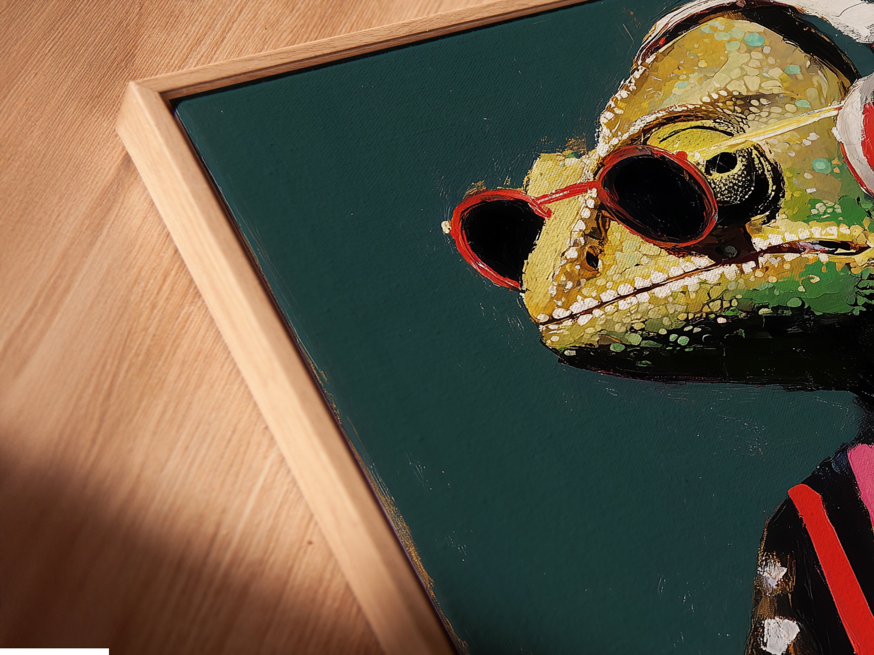 A close-up of the DJ Iguana canvas print in a floating frame. The floating frame enhances the modern art style. It's a unique piece for music studio decor. This cool animal art is perfect for any funky space.