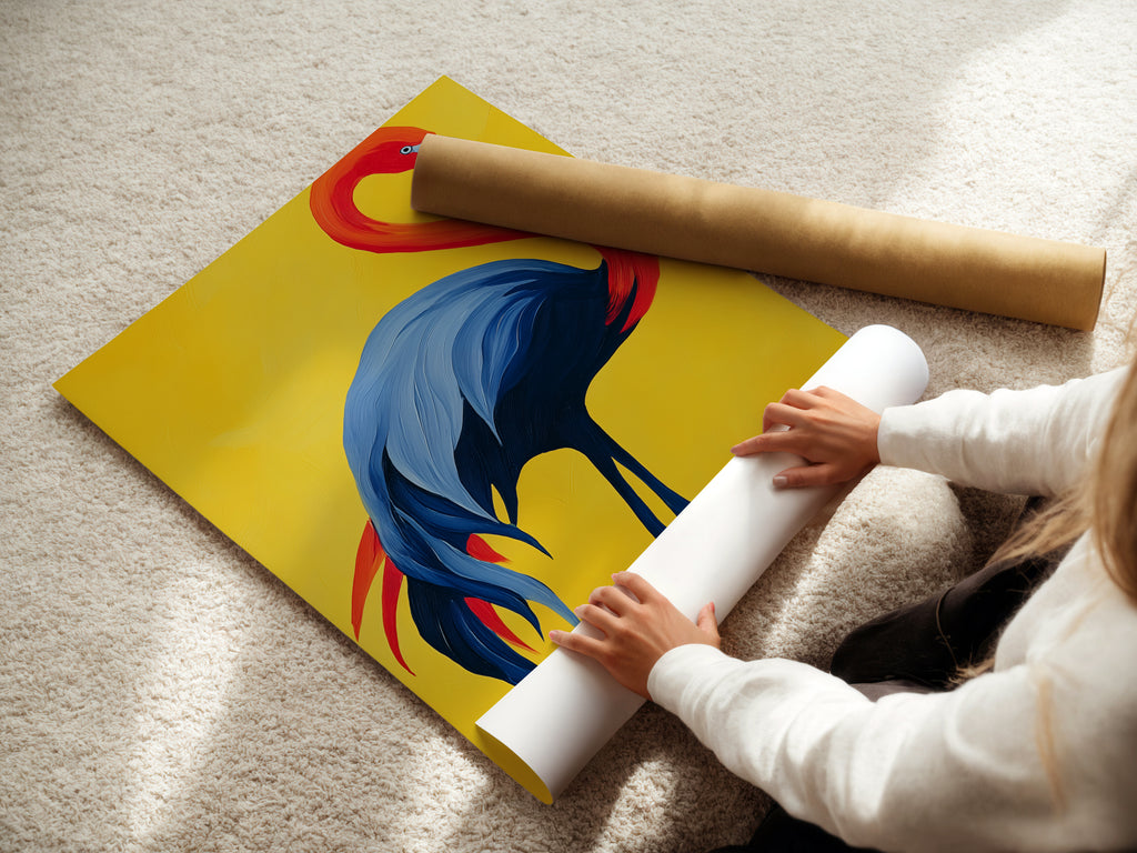 A woman is carefully rolling a fine art poster paper. The paper features the flamingo artwork. This ensures safe and pristine delivery. The red blue and yellow colors are vividly displayed. Ready to be framed and enjoyed.
