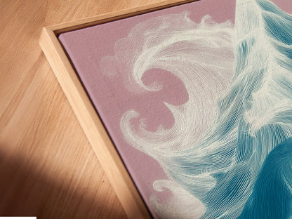 Angled close up of a ocean wave canvas print in a floating frame. This modern coastal art piece is perfect for creating a relaxing atmosphere. Its clean lines and vibrant colors make it a standout addition.