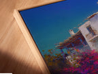 A close-up of the Mediterranean Village canvas artwork. It is displayed in a floating frame. The Greek Island staircase print is vivid. This coastal wall decor enhances any space. The blue and white artwork is stunning.