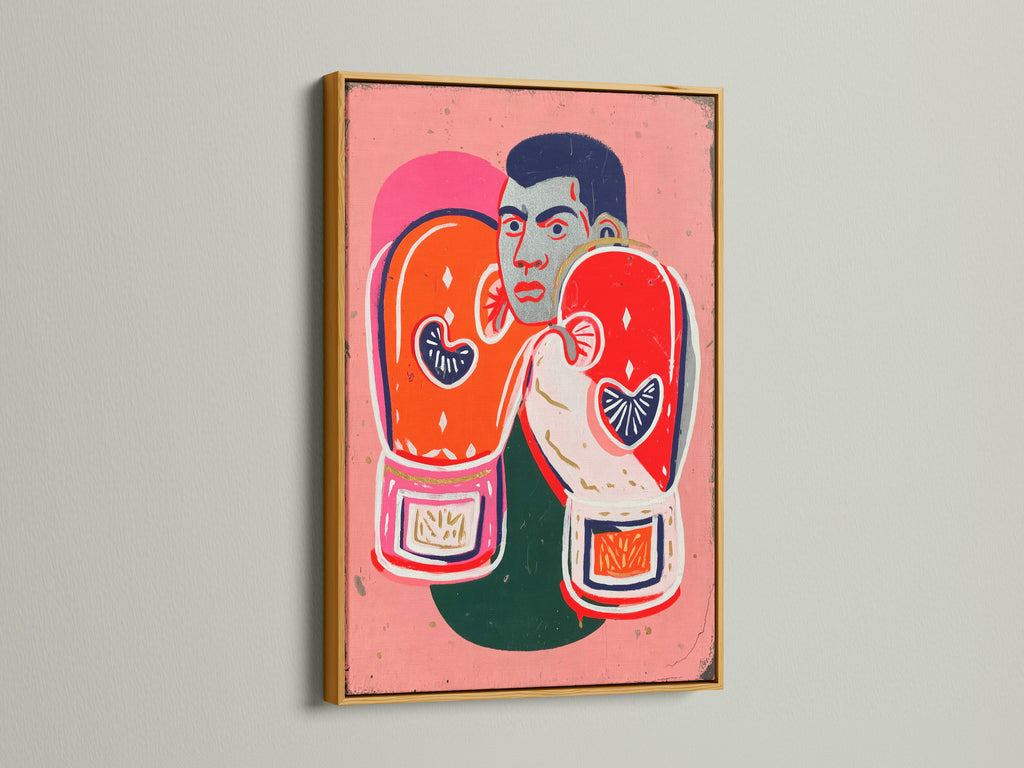 Gold frame enhancing the retro boxing legend artwork. The canvas print features a boxer with striking orange gloves. The primary color is orange and secondary pink. A perfect gift for sports fans or athletes.