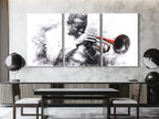 Canvasprint van een zwart-witte trompettist – accent van een rood instrument, dramatisch jazzkunstwerk