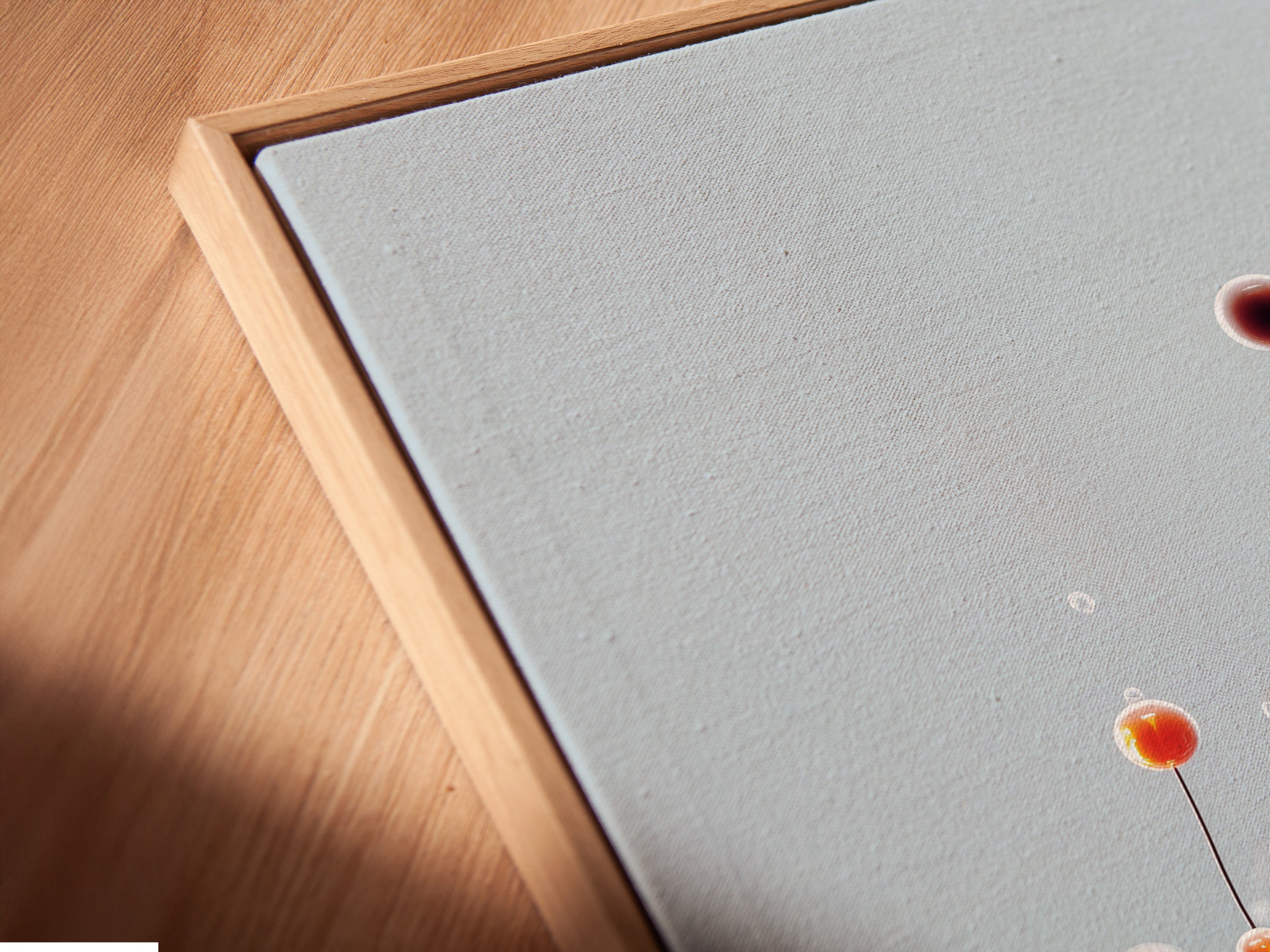 Close-up angled view of a canvas print in a floating frame. The floating frame gives a contemporary feel. This enhances the depth of the art. Explore our canvas prints in floating frames. Get yours now.