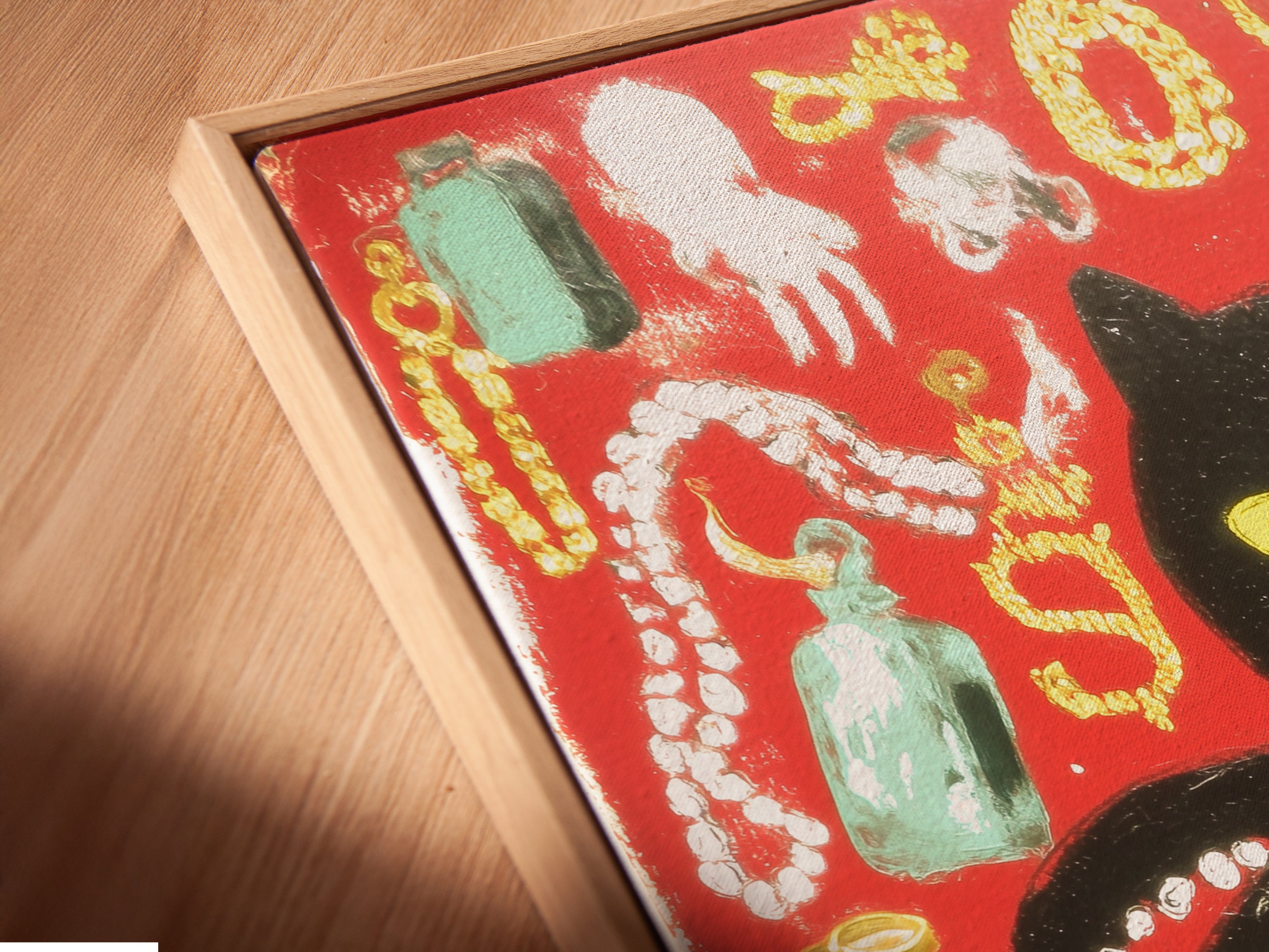 A close-up angled view of a canvas print in a floating frame. The black cat octopus artwork looks modern. The floating frame adds sophistication. This is a unique wall decor option.