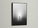 The black frame highlights the modern photography of this piece. This is a minimalist solitude canvas print. The foggy water reflection creates a contemplative mood. The artwork enhances office wall decor.
