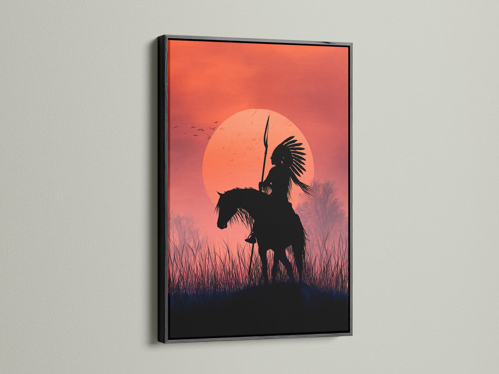 Native American Warrior canvas art in a black frame. This silhouette print captures the essence of western art. Enhance your decor with this tribal wall art featuring a horseback rider against a sunset. Perfect for southwestern-inspired spaces.