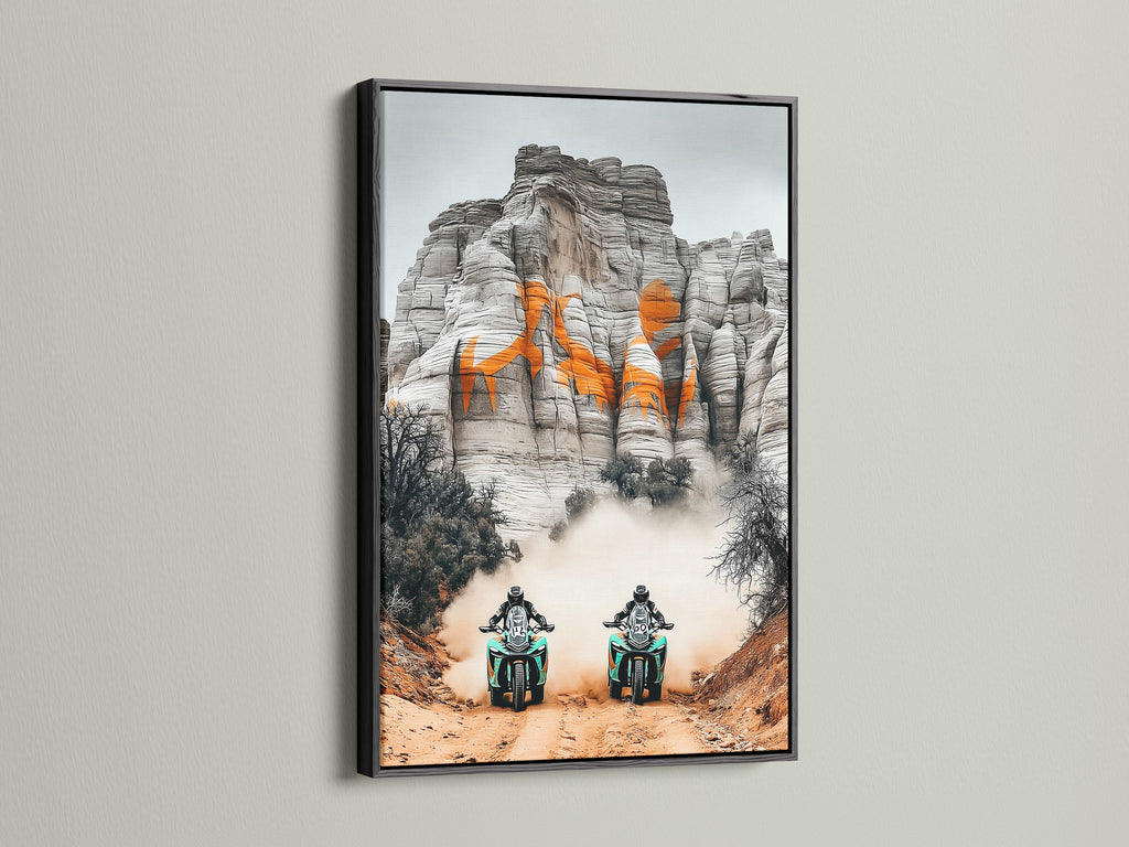 Make a bold statement with desert adventure art. This motorcycle wall art is showcased in a black frame. Ideal sports canvas print for man cave decor. Homeowners and garage owners will love this off road racing artwork. Add a touch of adventure artwork to your office or sports bar with this desert landscape motorcycle print.