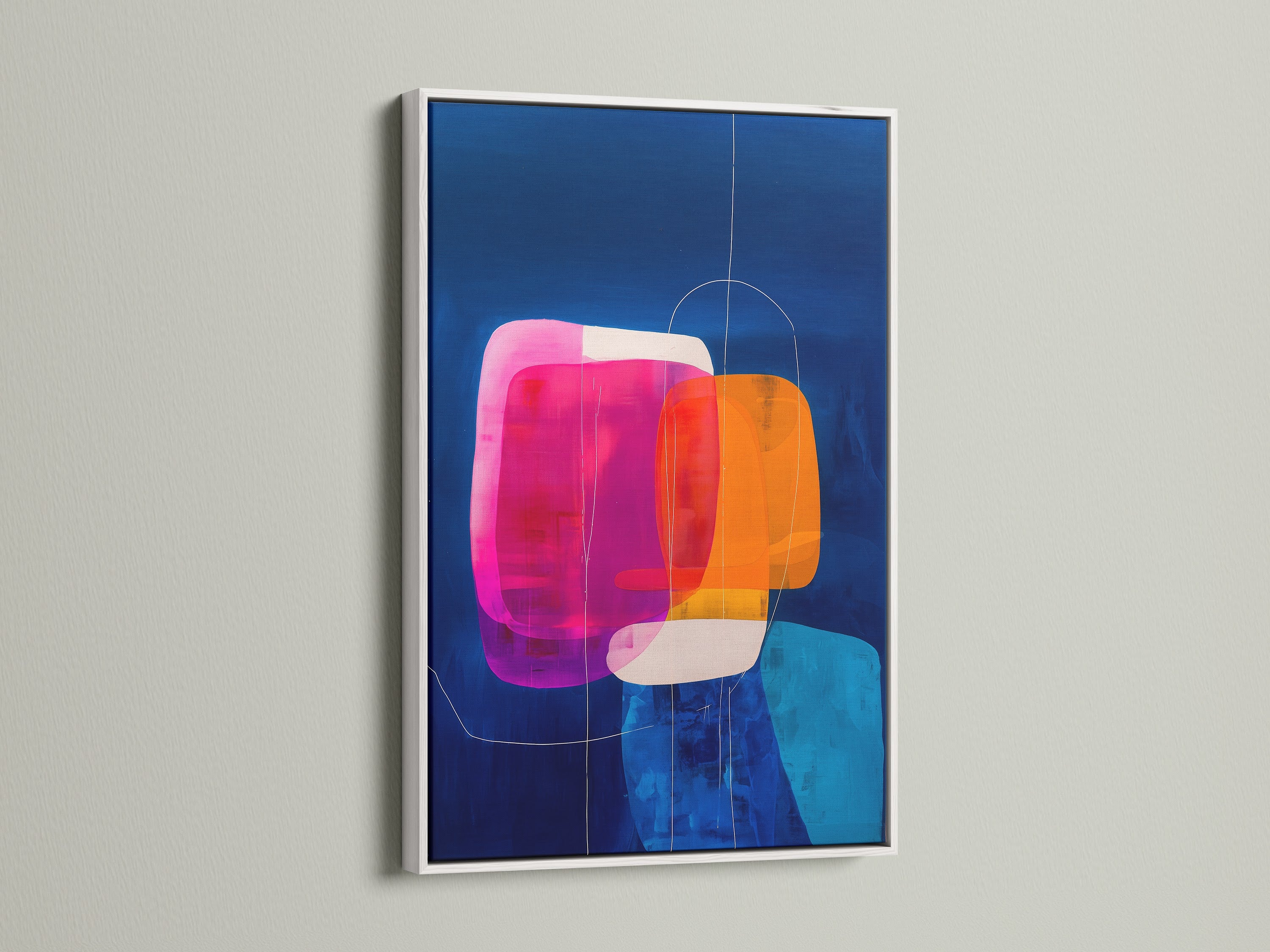 Modern abstract geometric artwork is showcased in a white frame. The colorful print features blue orange and pink shapes. It creates a striking visual impact on a white wall. Elevate your living room bedroom or office decor