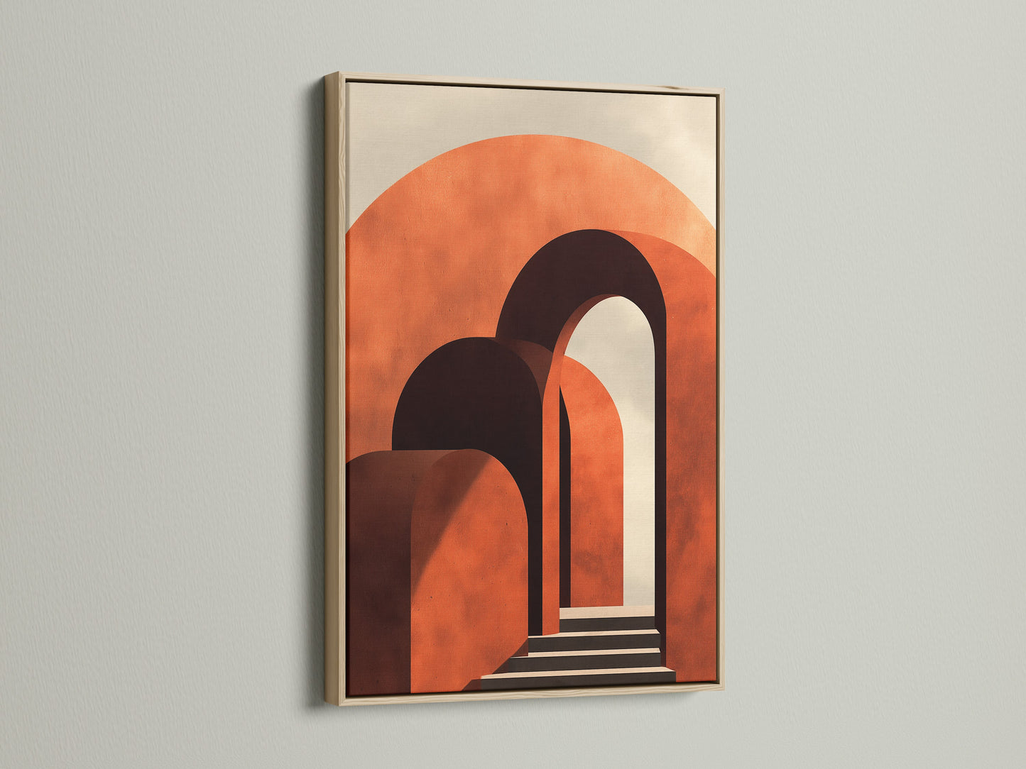 Artwork with an oak frame hangs against a bright white wall. The art presents an array of arches in terracotta tones. The oak frame enhances the artwork's warmth and invites a touch of nature into the space.