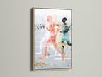 Abstract Runners Art Print with an oak frame on a white wall. This modern sports wall art adds sophistication to any space. The contemporary figure canvas print features coral and teal hues. Enhance your office wall decor with this unique runner artwork.