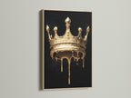 Melting Crown artwork with an oak frame. The artwork features a gold melting crown on a black background. This gothic wall art will add a touch of luxury to your home. Perfect for living rooms bedrooms and offices.