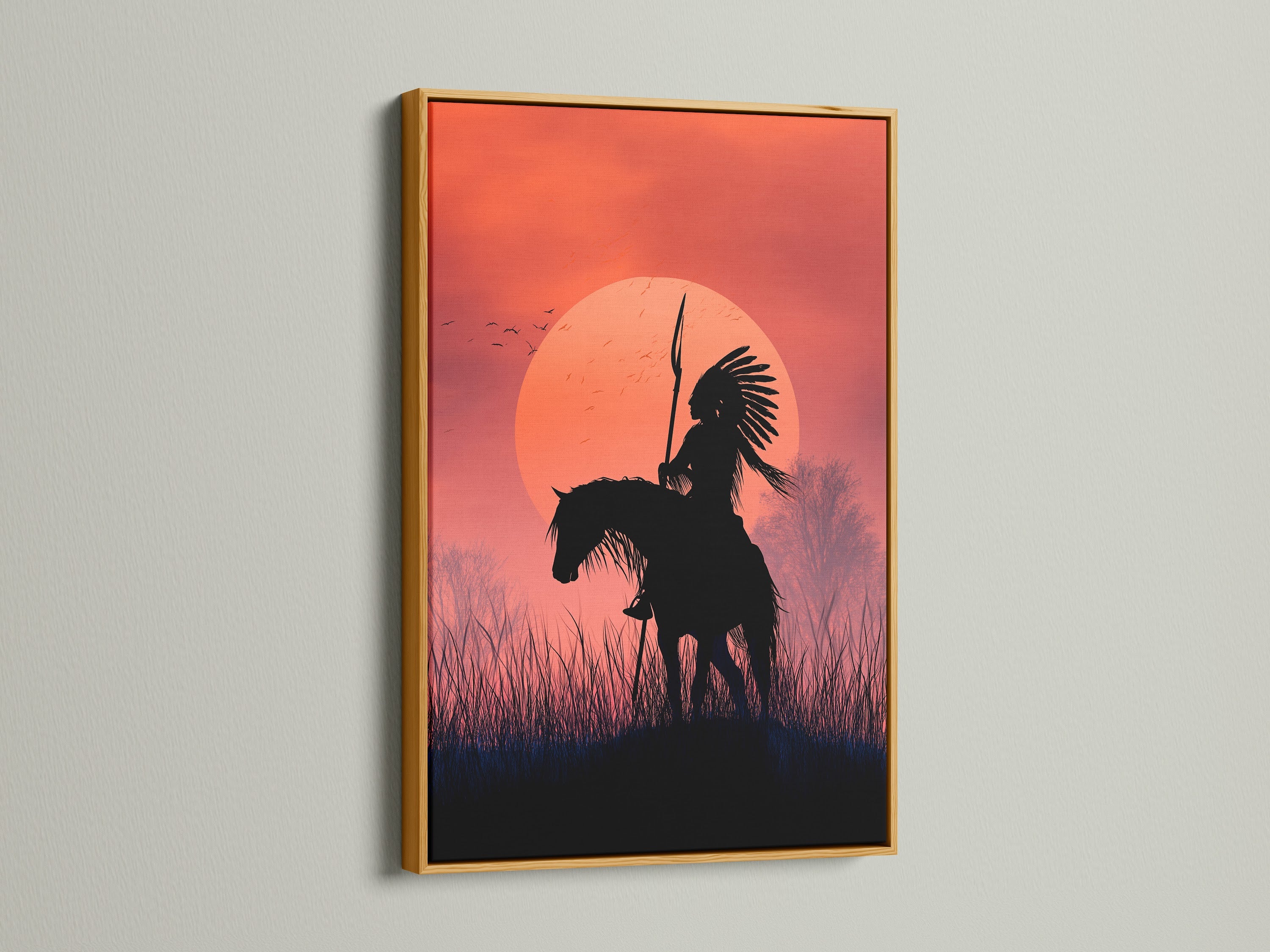 Native American Warrior artwork in a gold frame. This canvas art features a striking horseback rider silhouette against a sunset. Add a touch of tribal elegance to your wall with this western art print. Ideal for southwestern decor.