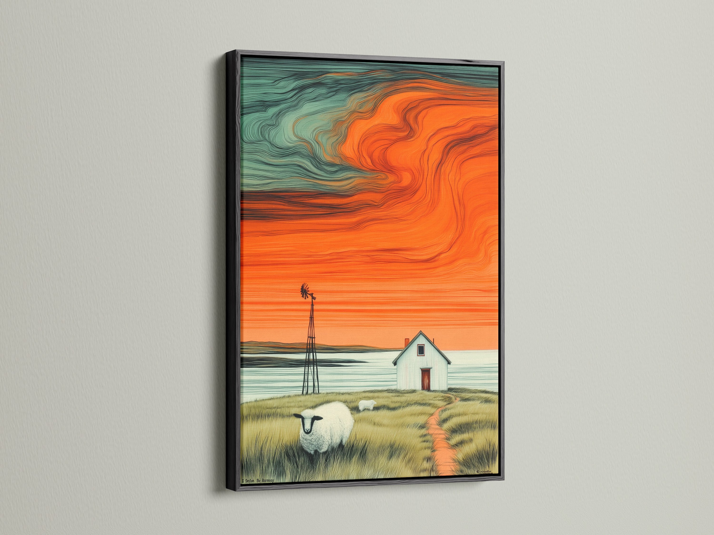 A striking farmhouse landscape canvas print is presented in a black frame. The artwork depicts a windmill a charming house sheep and an orange sunset. The black frame enhances the artwork's colors. This is perfect for rustic wall art.
