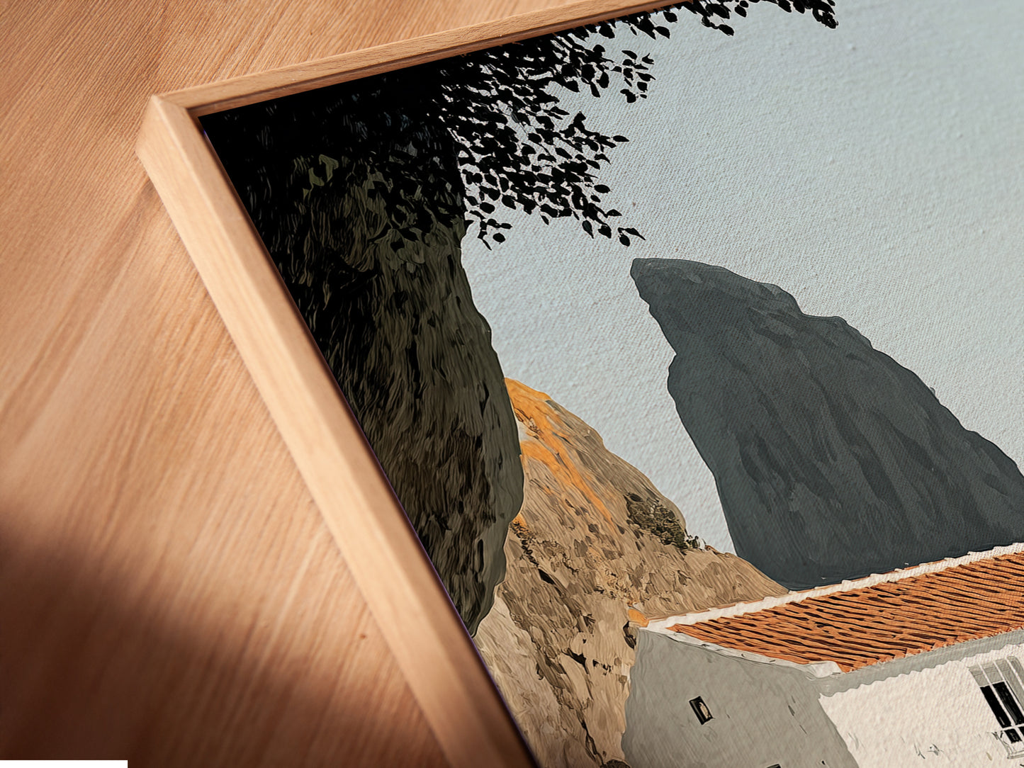 A close-up angled view reveals a canvas print in a floating frame. The artwork features a coastal villa. Perfect for adding a refined touch to any room. Ideal for homeowners renters and interior stylists seeking refined coastal wall art.