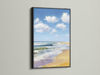 Stunning beach-themed artwork. It is presented in a sleek black frame. The black frame adds a touch of sophistication. It creates a striking contrast with the artwork. It makes it a focal point.