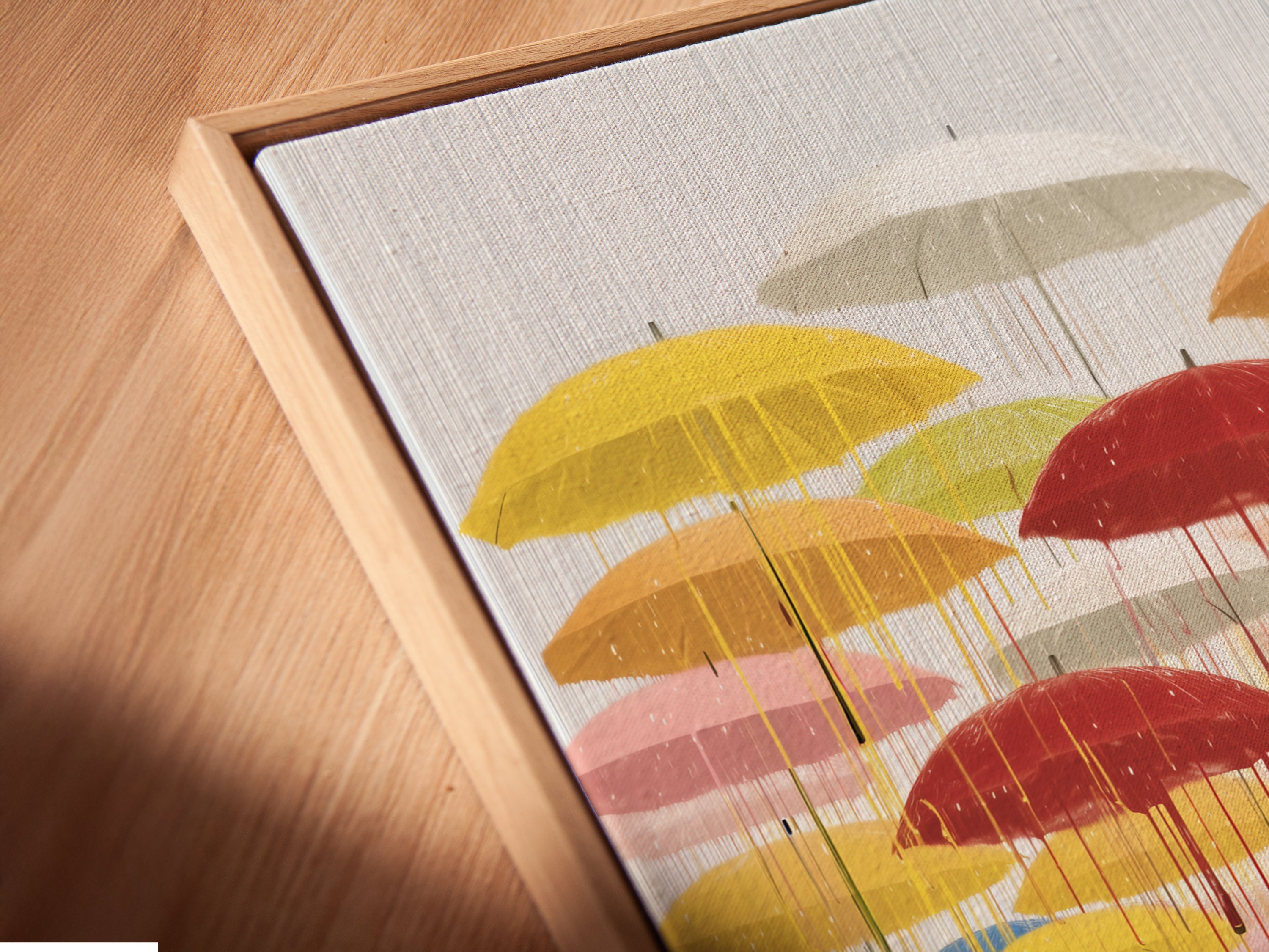 A close-up angled view of the 'Umbrella' canvas print is shown. It is set in a floating frame. This modern abstract artwork features vibrant colors and a unique reflective quality. The floating frame enhances the art's contemporary style. It creates a stunning visual effect for your home or office.