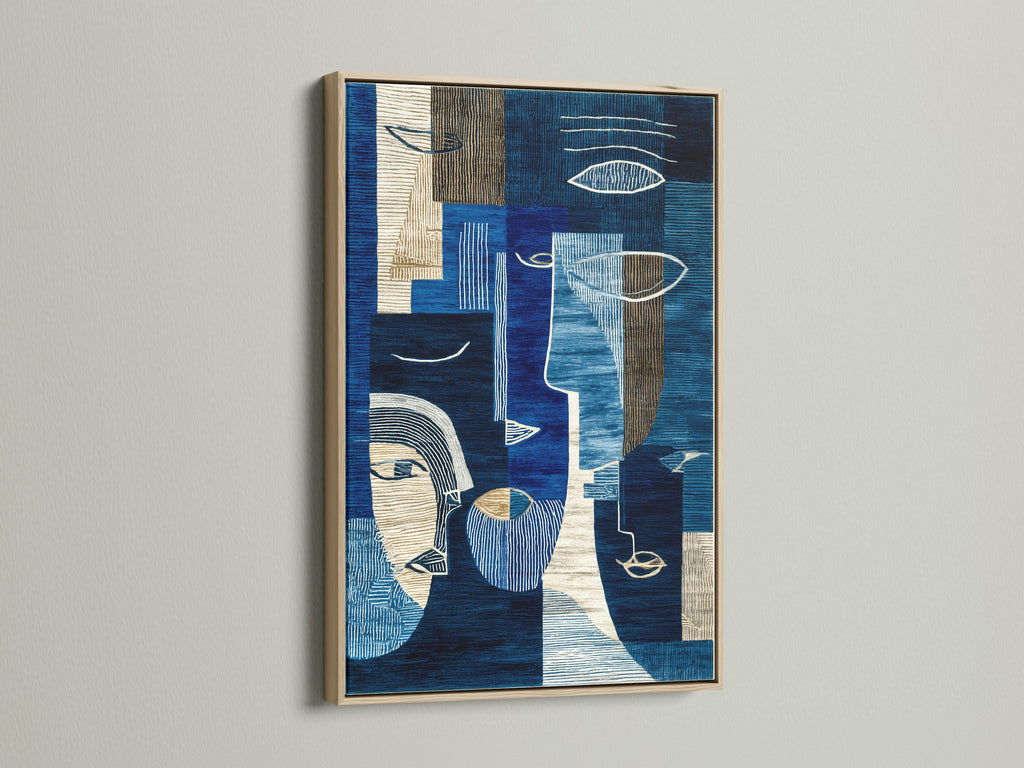 This is an abstract blue art print showcased in an oak frame. The modern geometric canvas wall art adds a touch of sophistication. The navy and cream artwork is ideal for living rooms or collaborative workspaces. Enhance your space with this contemporary print