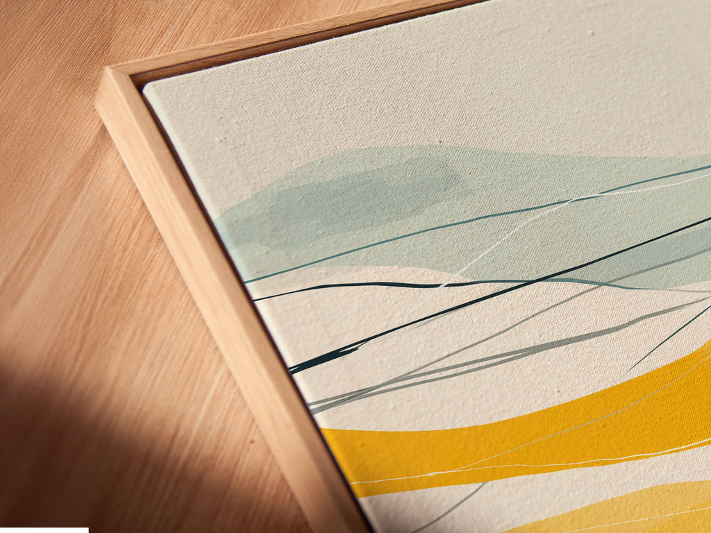 Angled close up of a canvas print in a floating frame. The Abstract Mountain artwork features a colorful landscape. This modern geometric artwork is perfect for office decor. It will enhance any living room or bedroom. This artwork will complement minimalist aesthetics.