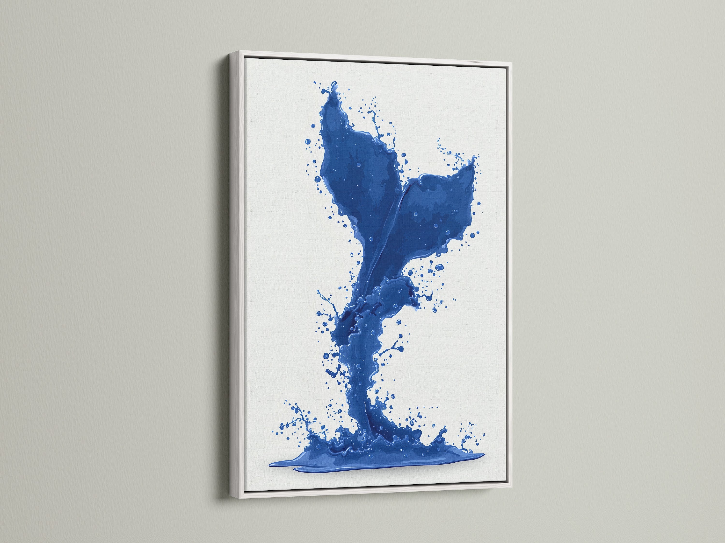 A vibrant cobalt blue whale tail artwork. The artwork is encased in a clean white frame. This nautical splash print is ideal for bathroom decor. Its refreshing aesthetic enhances any room.