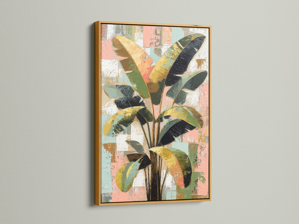 Tropical plant artwork showcased in a gold frame. The botanical canvas print enhances any space. This modern wall art complements boho decor. A stylish addition to spas boutiques and waiting areas.