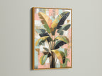 Tropical plant artwork showcased in a gold frame. The botanical canvas print enhances any space. This modern wall art complements boho decor. A stylish addition to spas boutiques and waiting areas.