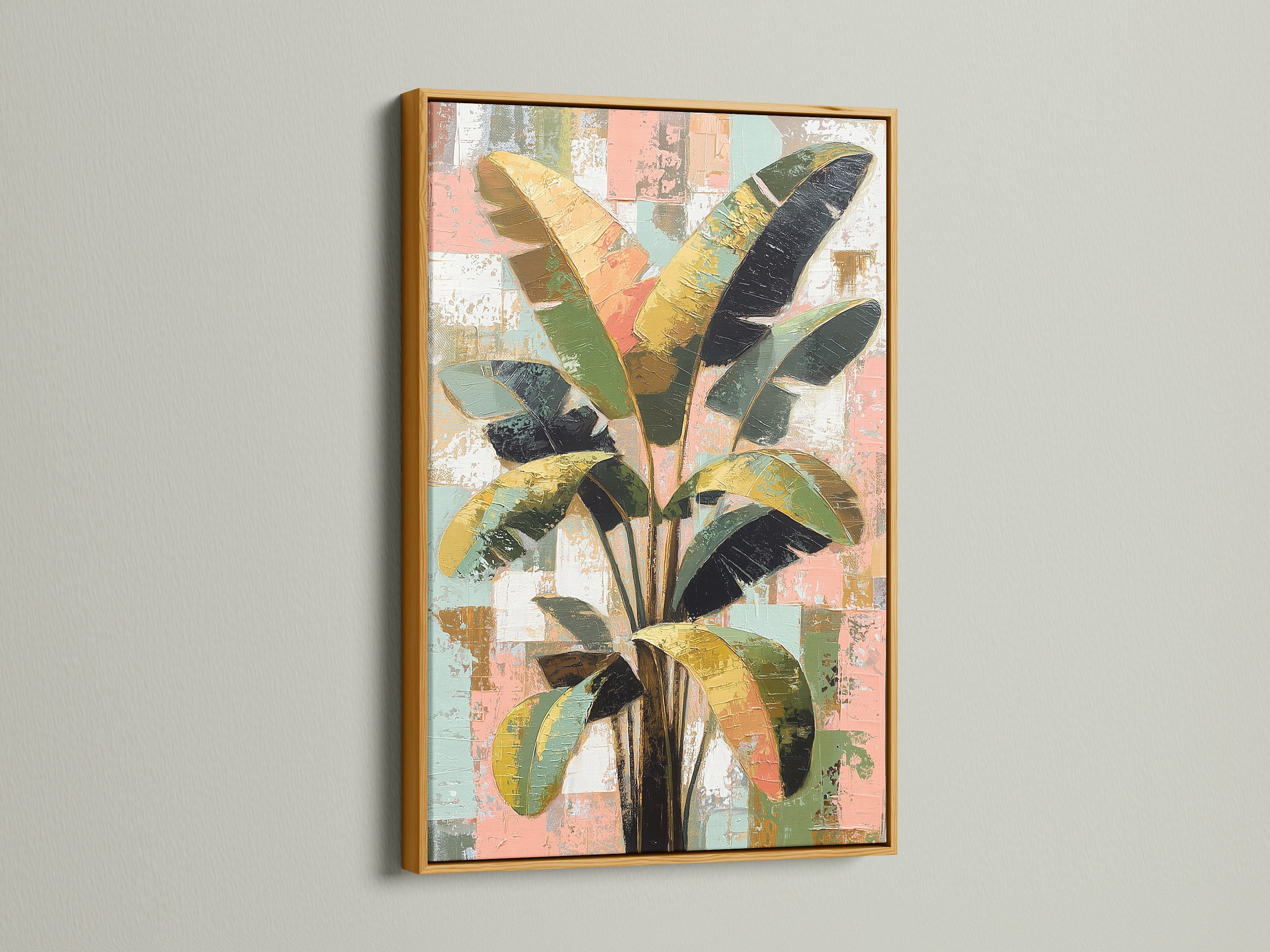 Tropical plant artwork showcased in a gold frame. The botanical canvas print enhances any space. This modern wall art complements boho decor. A stylish addition to spas boutiques and waiting areas.