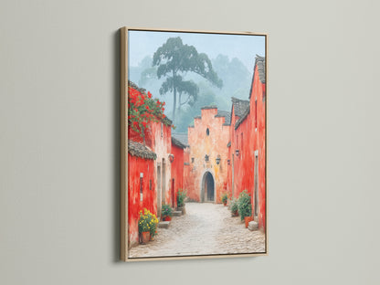 Village Street canvas print in an oak frame. The oak frame enhances the rustic charm of this vintage style art. Perfect for adding a touch of European flair to your entryway or living room.  This art brings warmth to any space.