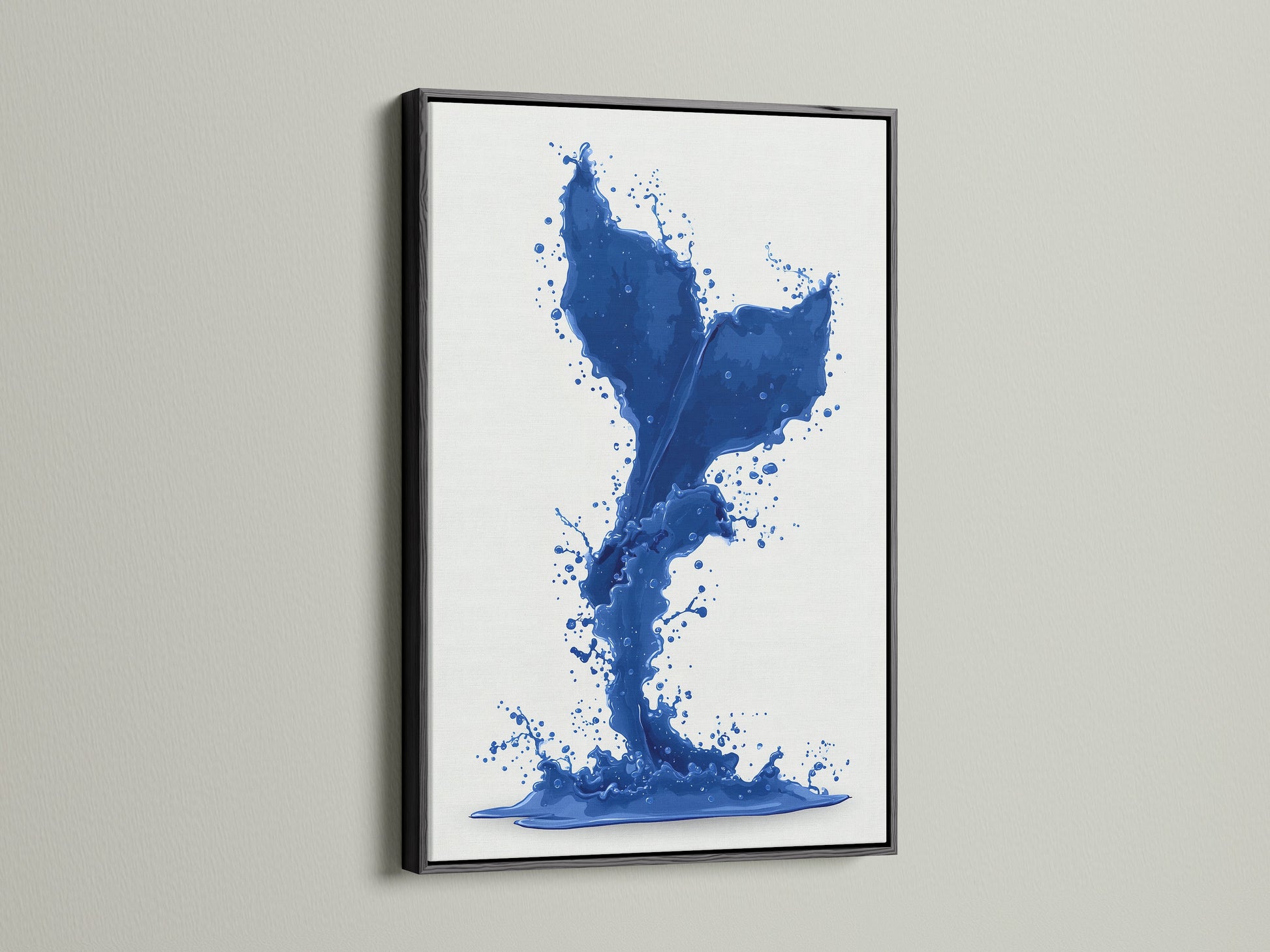 A modern cobalt blue whale tail artwork. The artwork is presented in a sleek black frame. Add a sophisticated touch to your coastal artwork collection. This sea life print is a stylish choice.