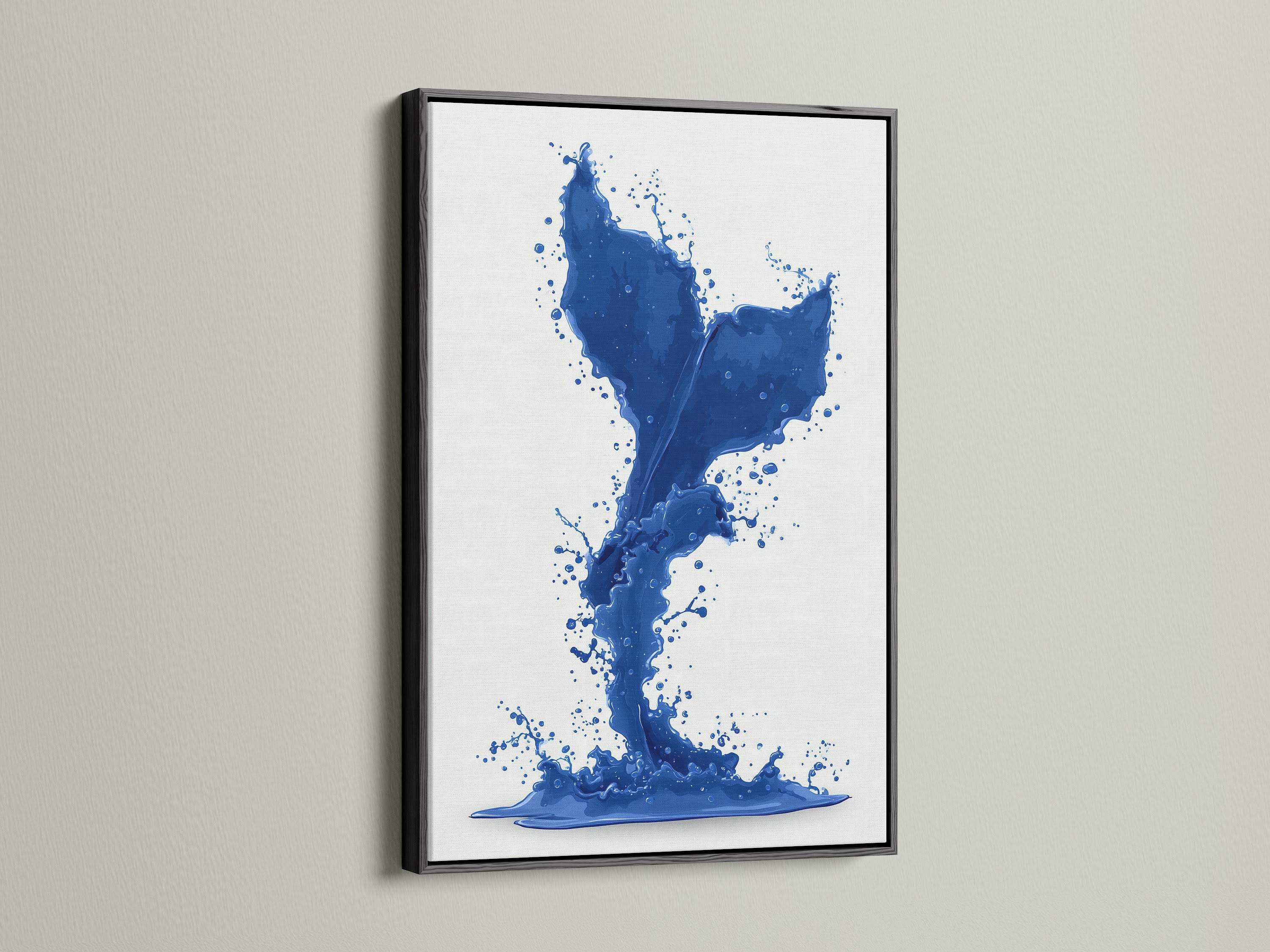 A modern cobalt blue whale tail artwork. The artwork is presented in a sleek black frame. Add a sophisticated touch to your coastal artwork collection. This sea life print is a stylish choice.