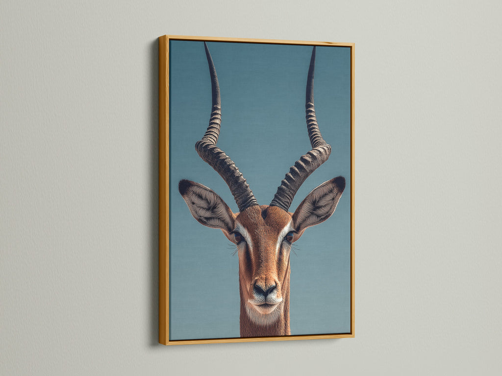 An Impala art print is elegantly displayed. The print is set in a luxurious gold frame. The gold frame adds a touch of glamour. It enhances the artwork with a warm metallic hue.