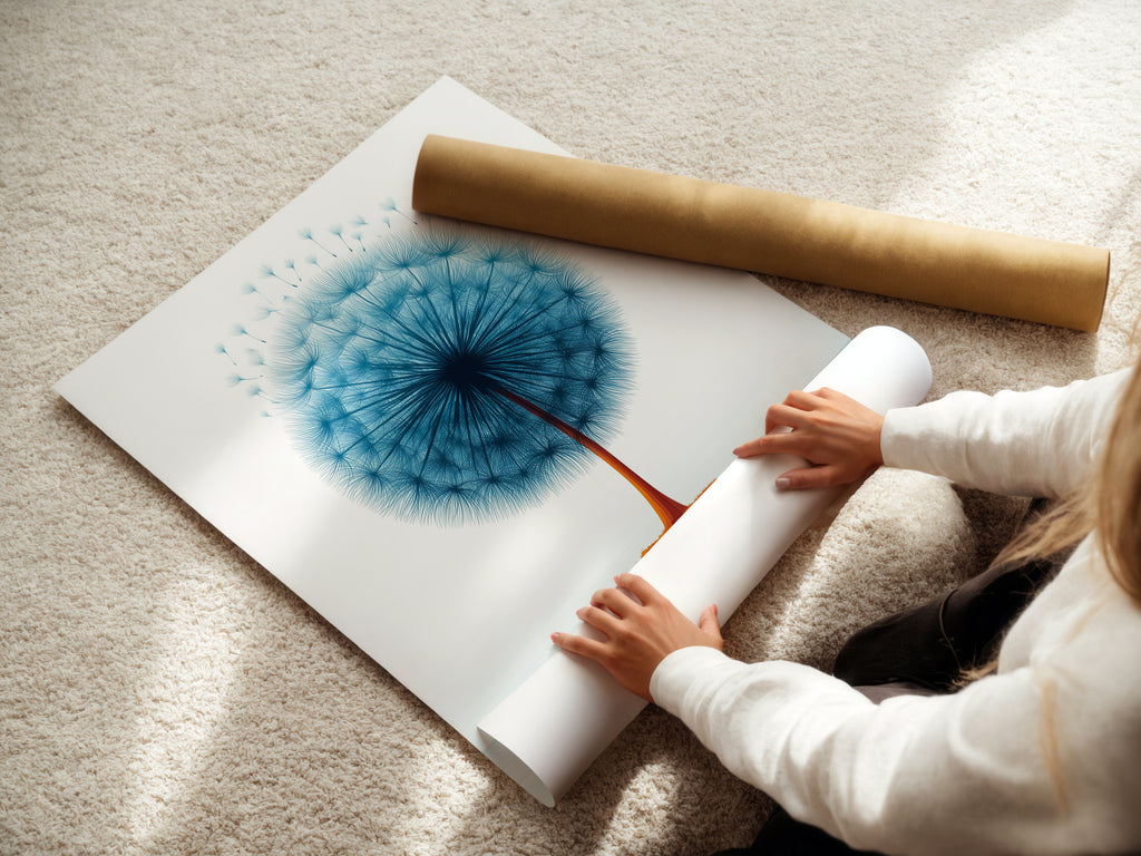 A woman carefully rolling a fine art poster paper featuring dandelion teal blue botanical artwork. High-quality paper ensures a lasting print. Ideal for minimalist floral artwork. Perfect for bedroom decor or scandi style art.