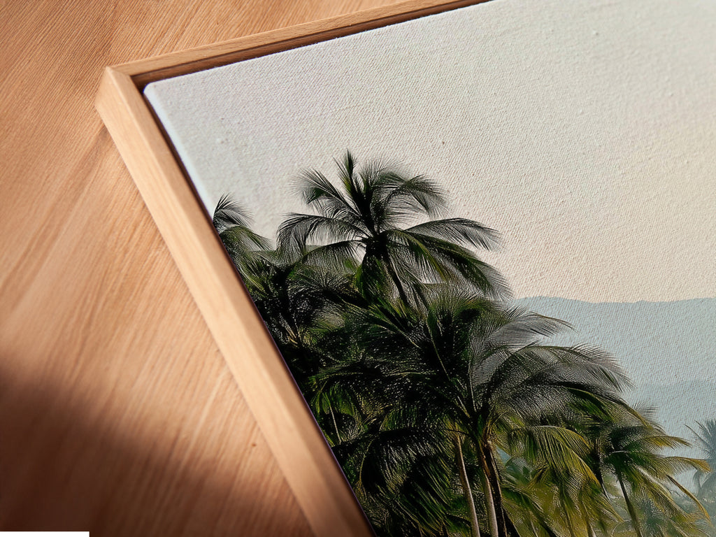 A close-up angle reveals a canvas print in a floating frame. The tropical beach artwork features pink sand. The coastal scenery is vibrant. It enhances any vacation home decor.