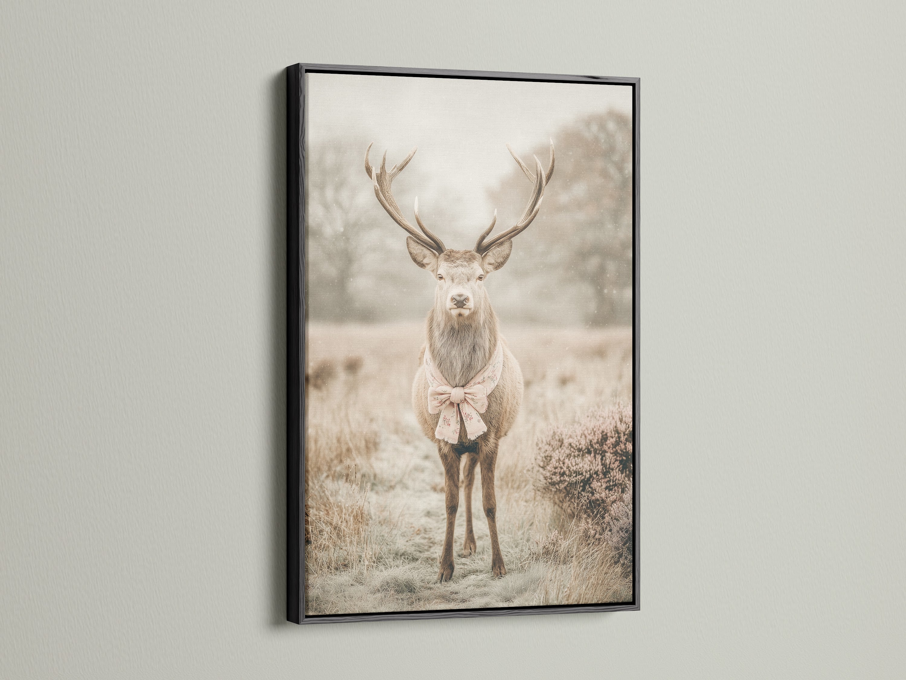 The deer with bow tie artwork is showcased in a black frame. The black frame adds a touch of sophistication to this nursery print. Ideal for rustic wall art and farmhouse wall decor. The artwork suits country vintage or eclectic decor styles. It is a versatile piece for living rooms bedrooms studios boutiques and waiting rooms.